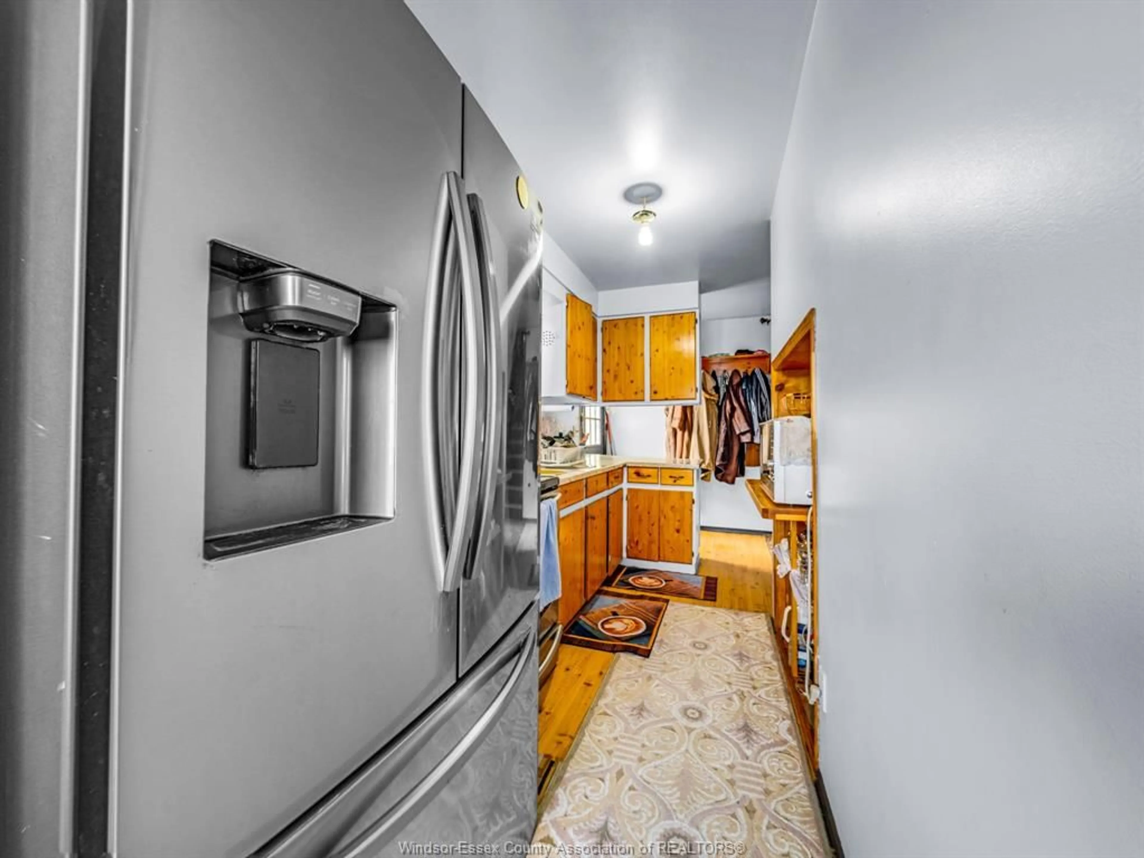 Kitchen with laundary machines, unknown for 23 DONALD Ave, Leamington Ontario N8H 4J4