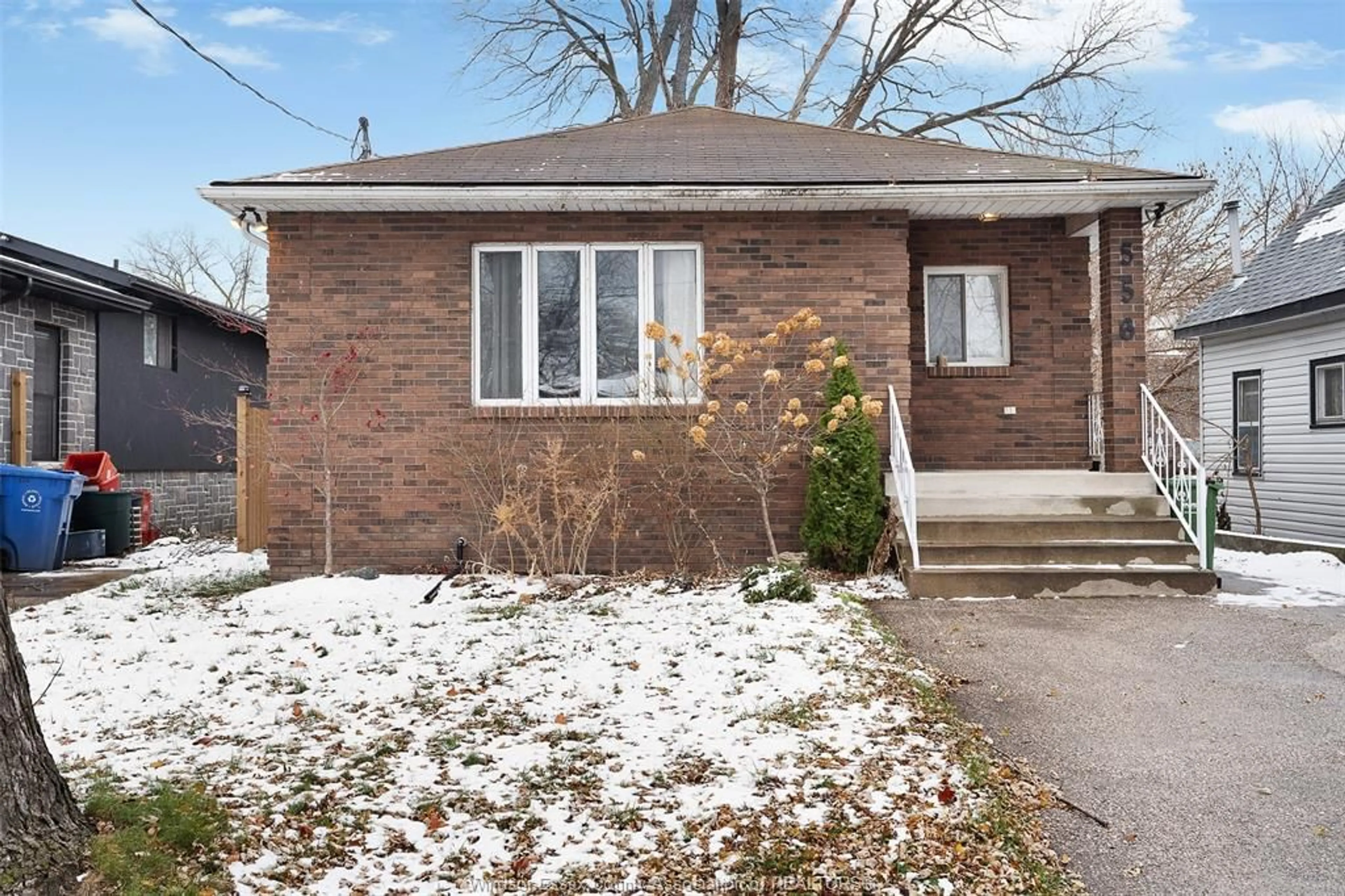 Home with brick exterior material, street for 556 Clover, Windsor Ontario N8P 1C6