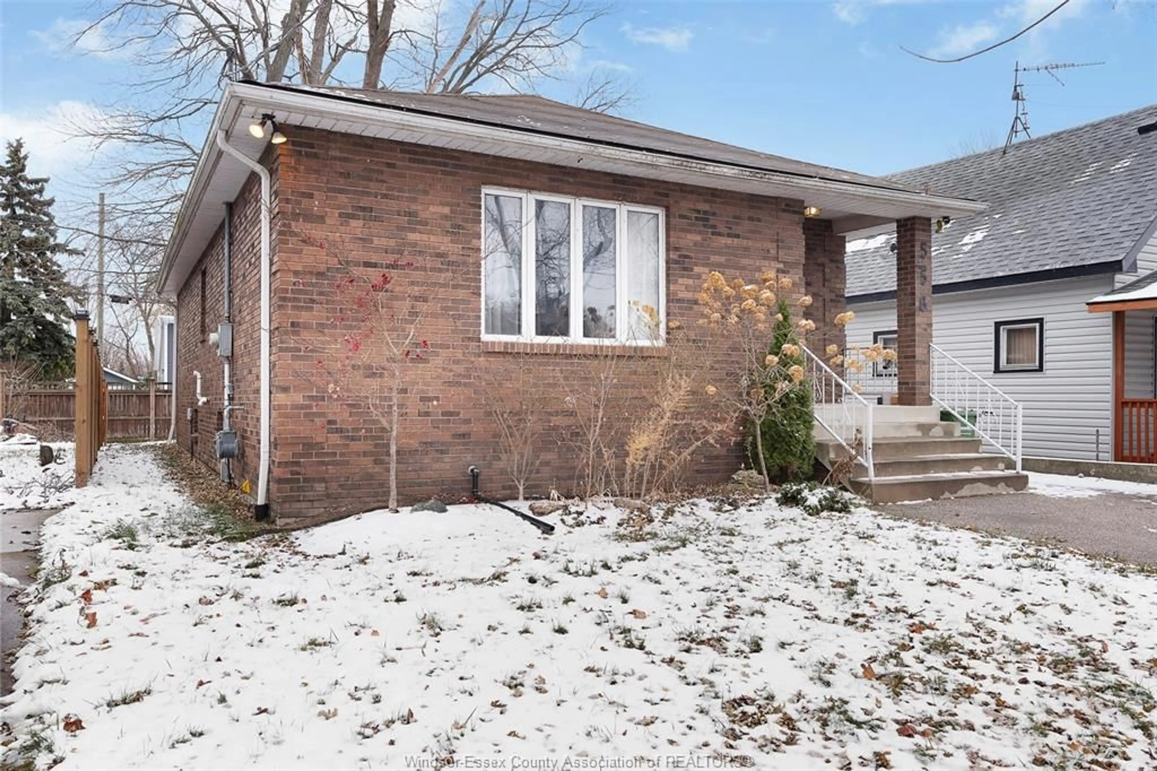 Home with brick exterior material, street for 556 Clover, Windsor Ontario N8P 1C6