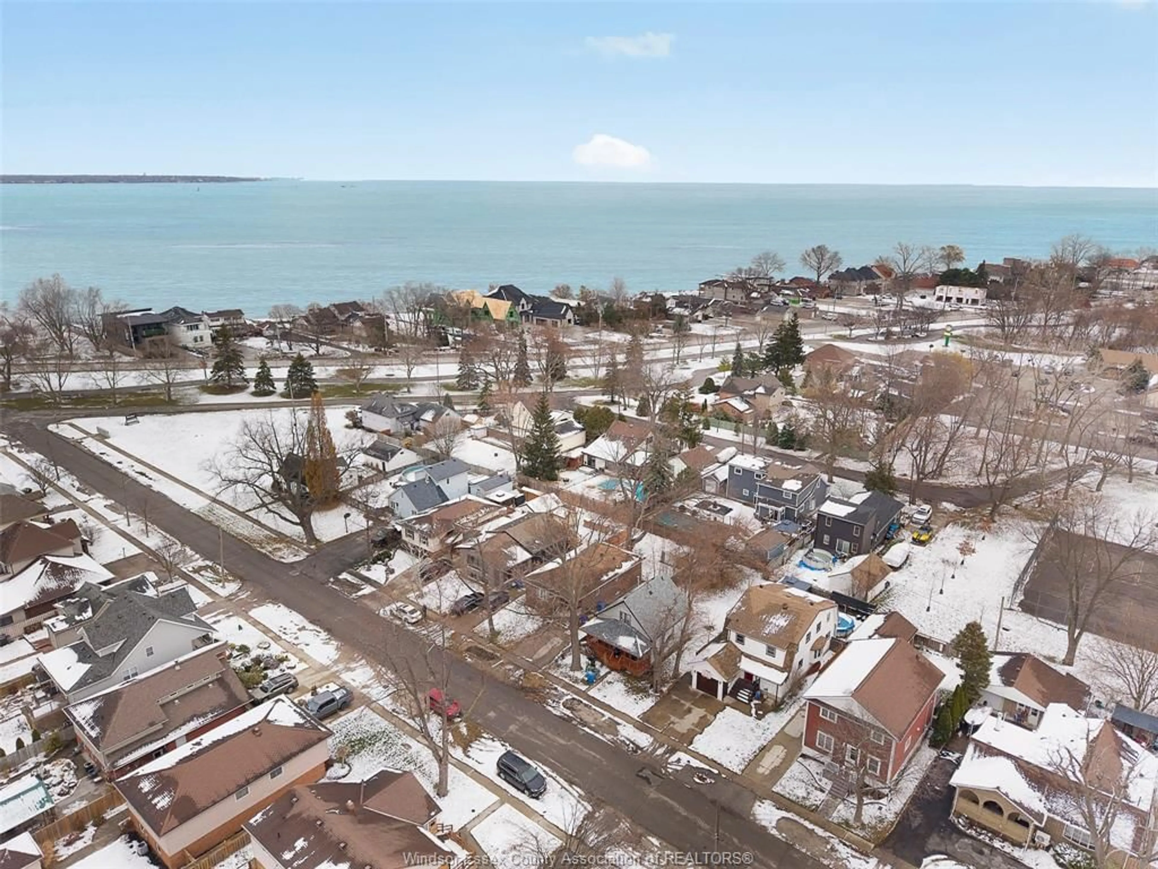 A pic from outside/outdoor area/front of a property/back of a property/a pic from drone, street for 556 Clover, Windsor Ontario N8P 1C6