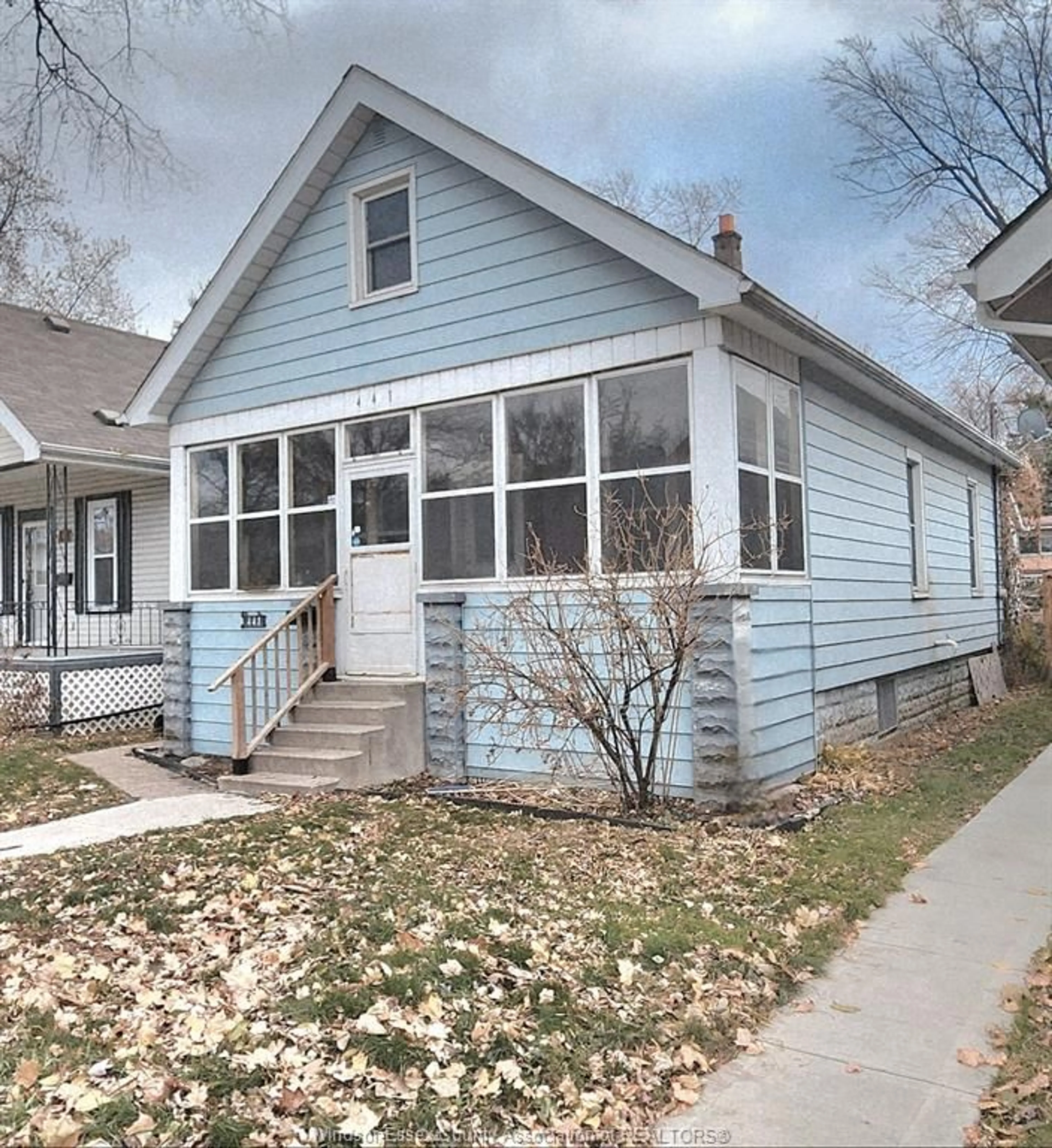 Home with vinyl exterior material, street for 441 ELLIS St, Windsor Ontario N8X 1B1