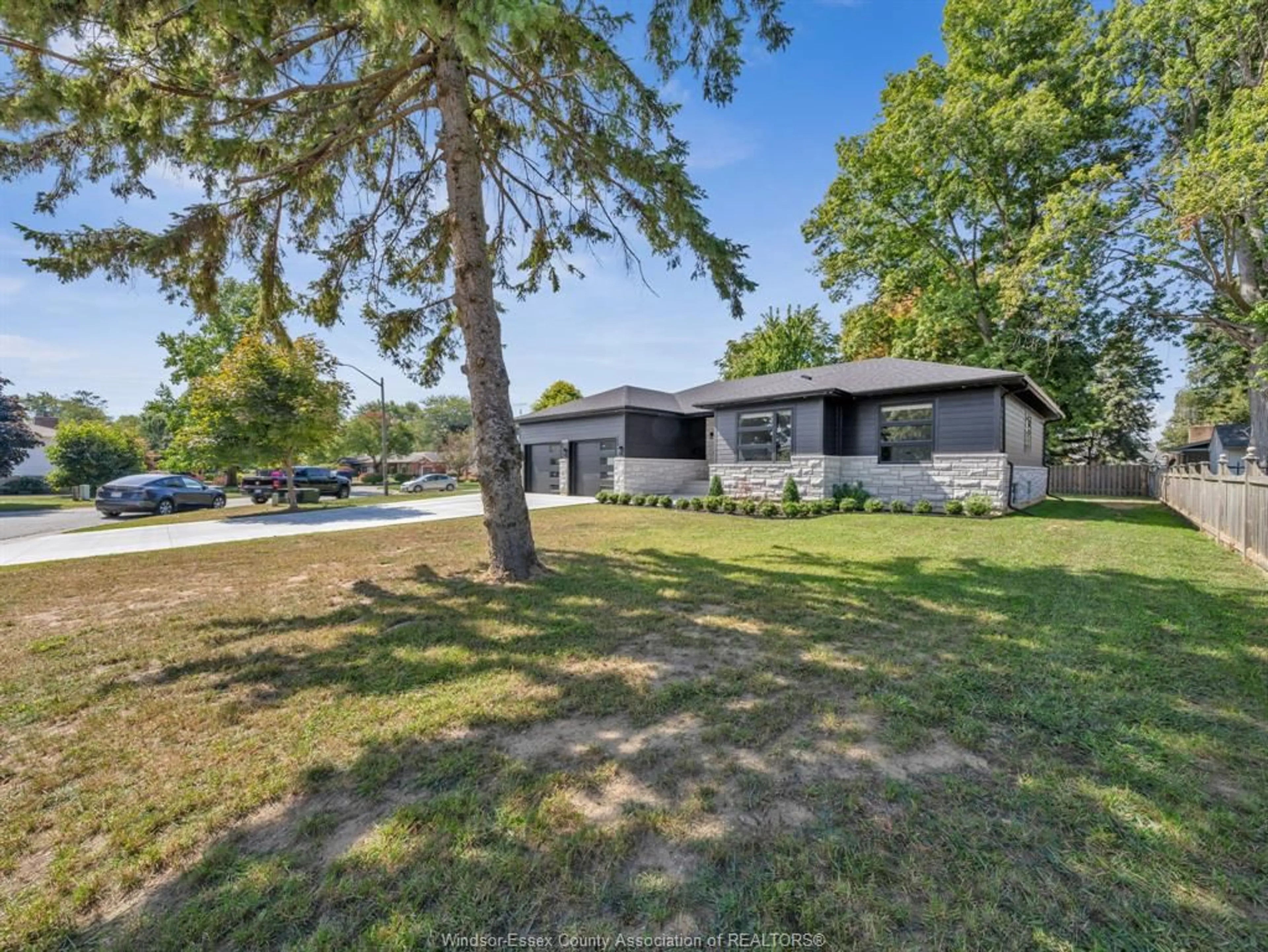 A pic from outside/outdoor area/front of a property/back of a property/a pic from drone, street for 1499 FULLER Dr, Kingsville Ontario N9Y 3M7