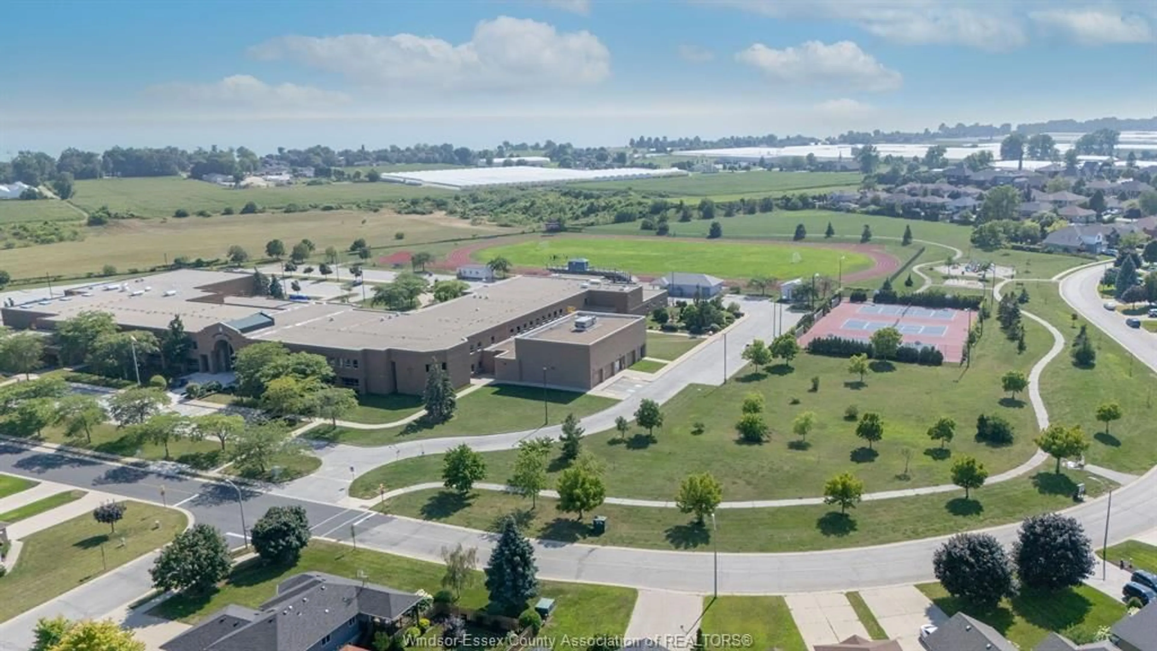 A pic from outside/outdoor area/front of a property/back of a property/a pic from drone, unknown for 28 CARTER Ave, Leamington Ontario N8H 5E1