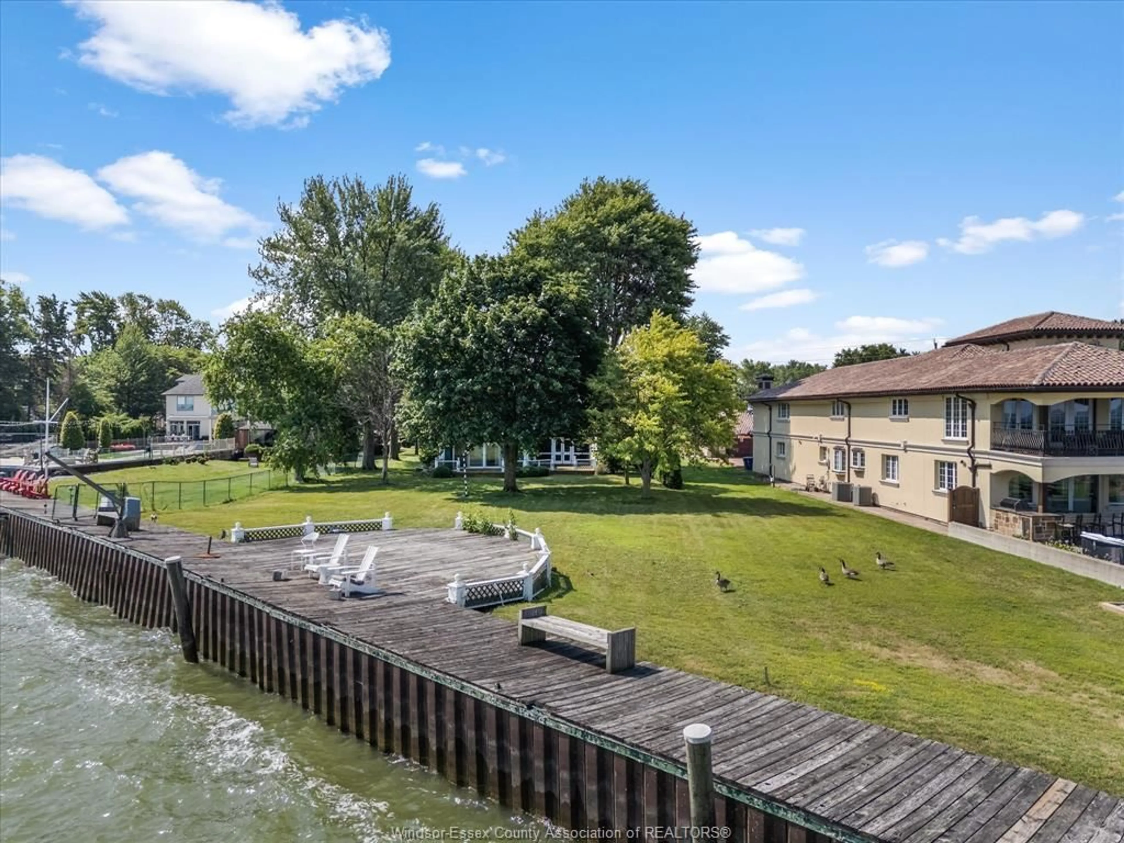 A pic from outside/outdoor area/front of a property/back of a property/a pic from drone, water/lake/river/ocean view for 13050 RIVERSIDE Dr, Tecumseh Ontario N8N 1A8
