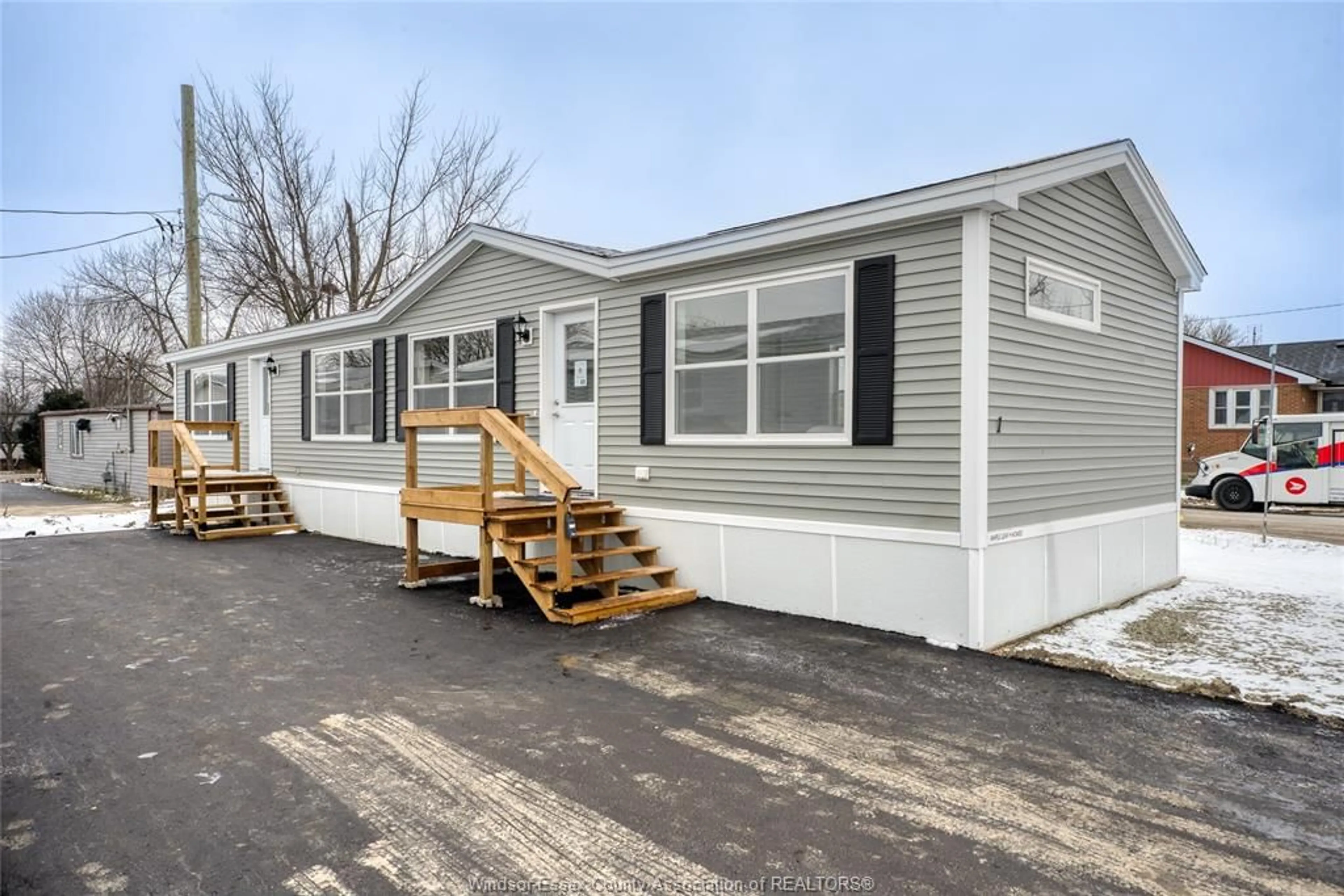 Home with vinyl exterior material, street for 24 REGINA, Lakeshore Ontario N8N 2P4