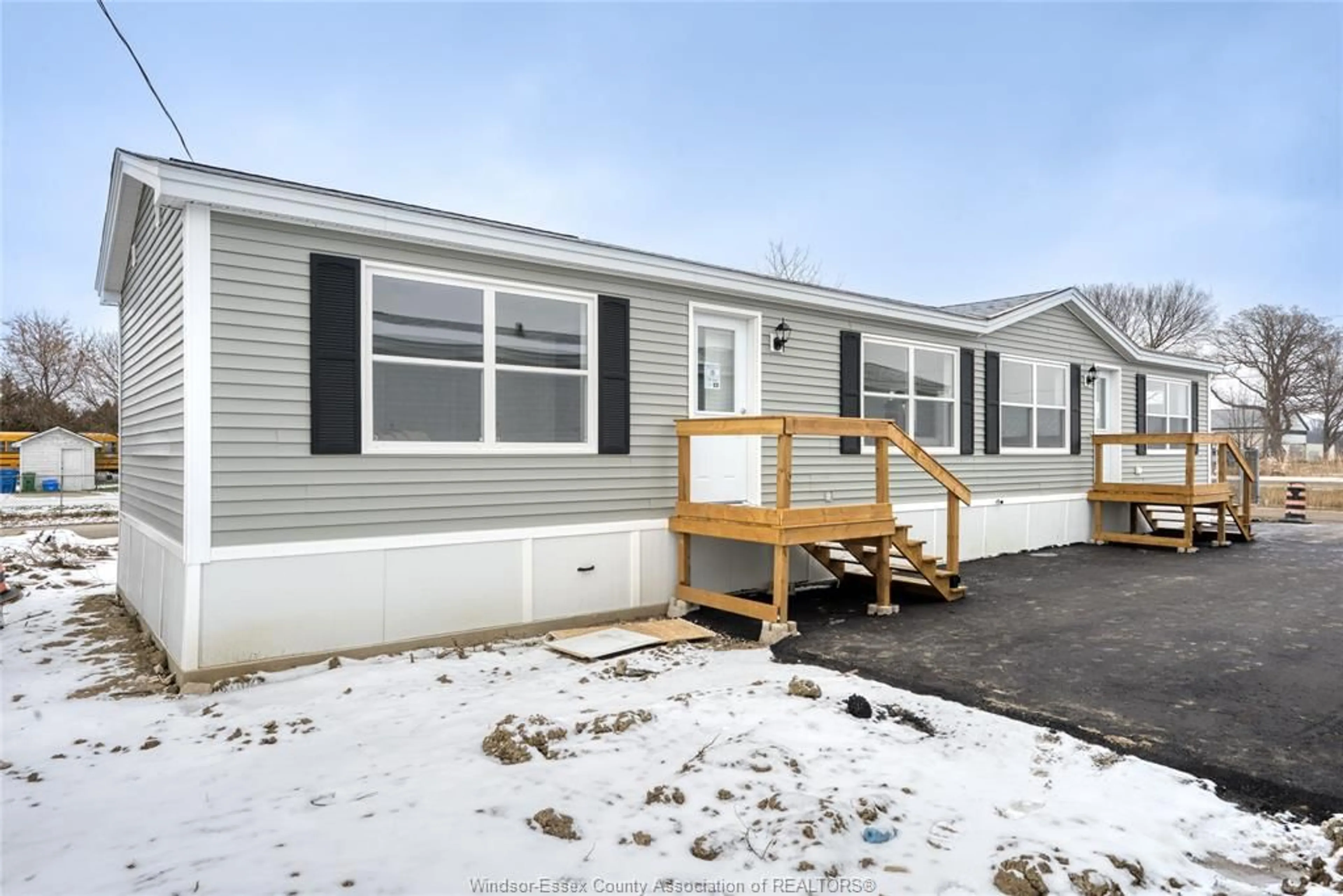 Home with vinyl exterior material, street for 24 REGINA, Lakeshore Ontario N8N 2P4