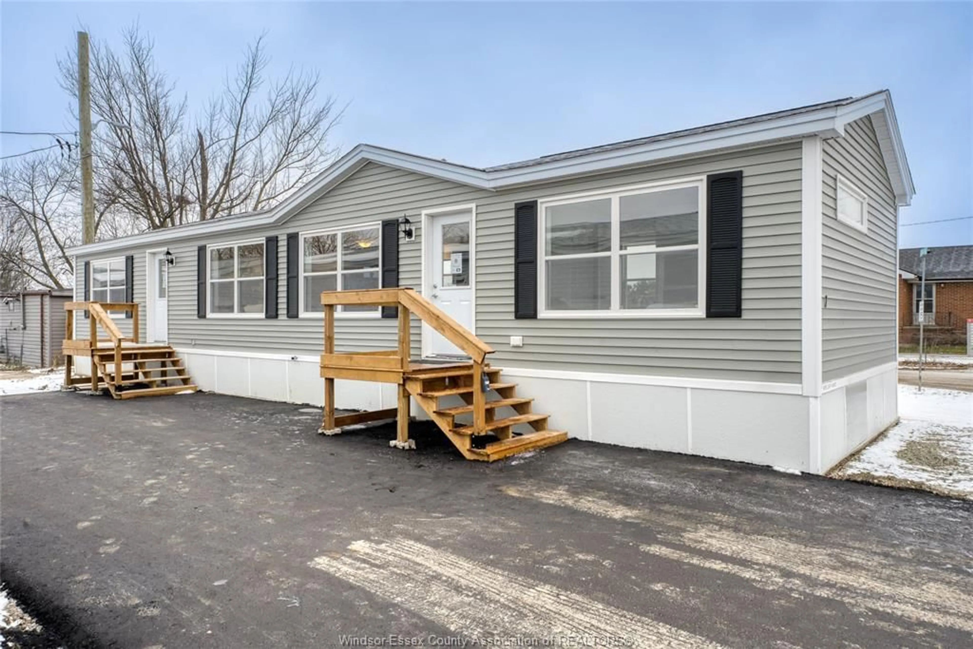 Home with vinyl exterior material, street for 24 REGINA, Lakeshore Ontario N8N 2P4