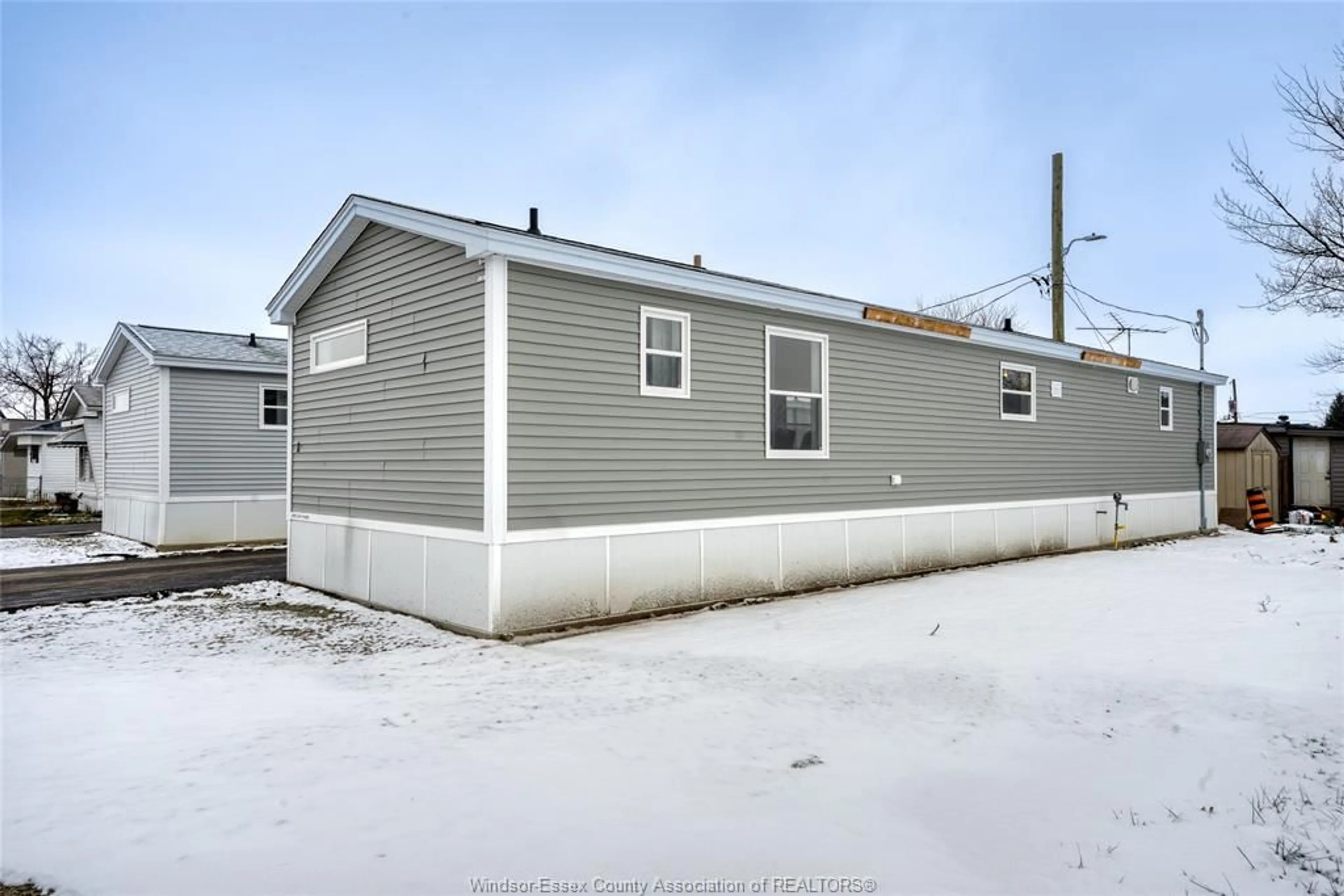 Home with vinyl exterior material, street for 24 REGINA, Lakeshore Ontario N8N 2P4