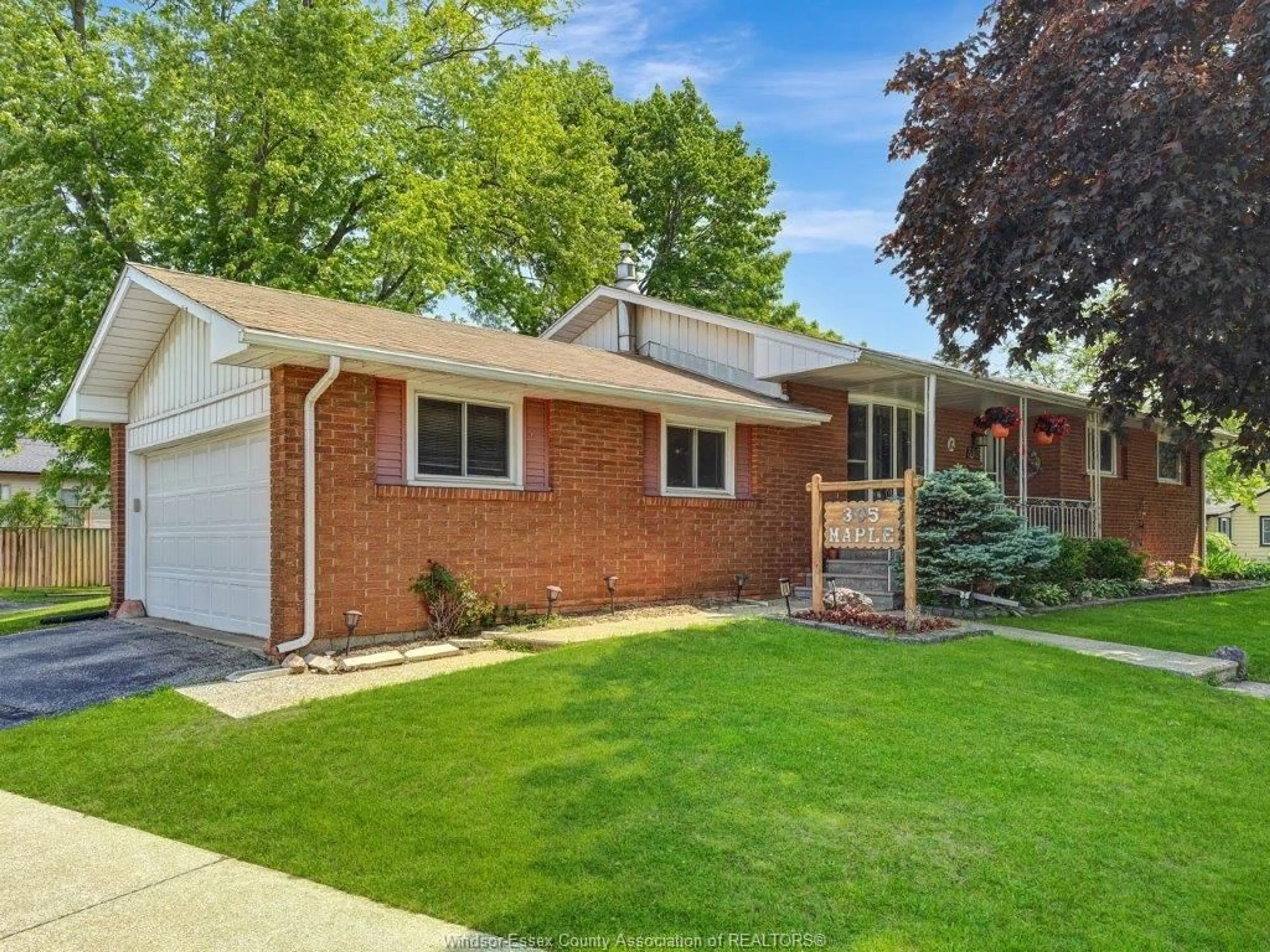 Home with brick exterior material, street for 305 MAPLE Ave, LaSalle Ontario N9J 1P1