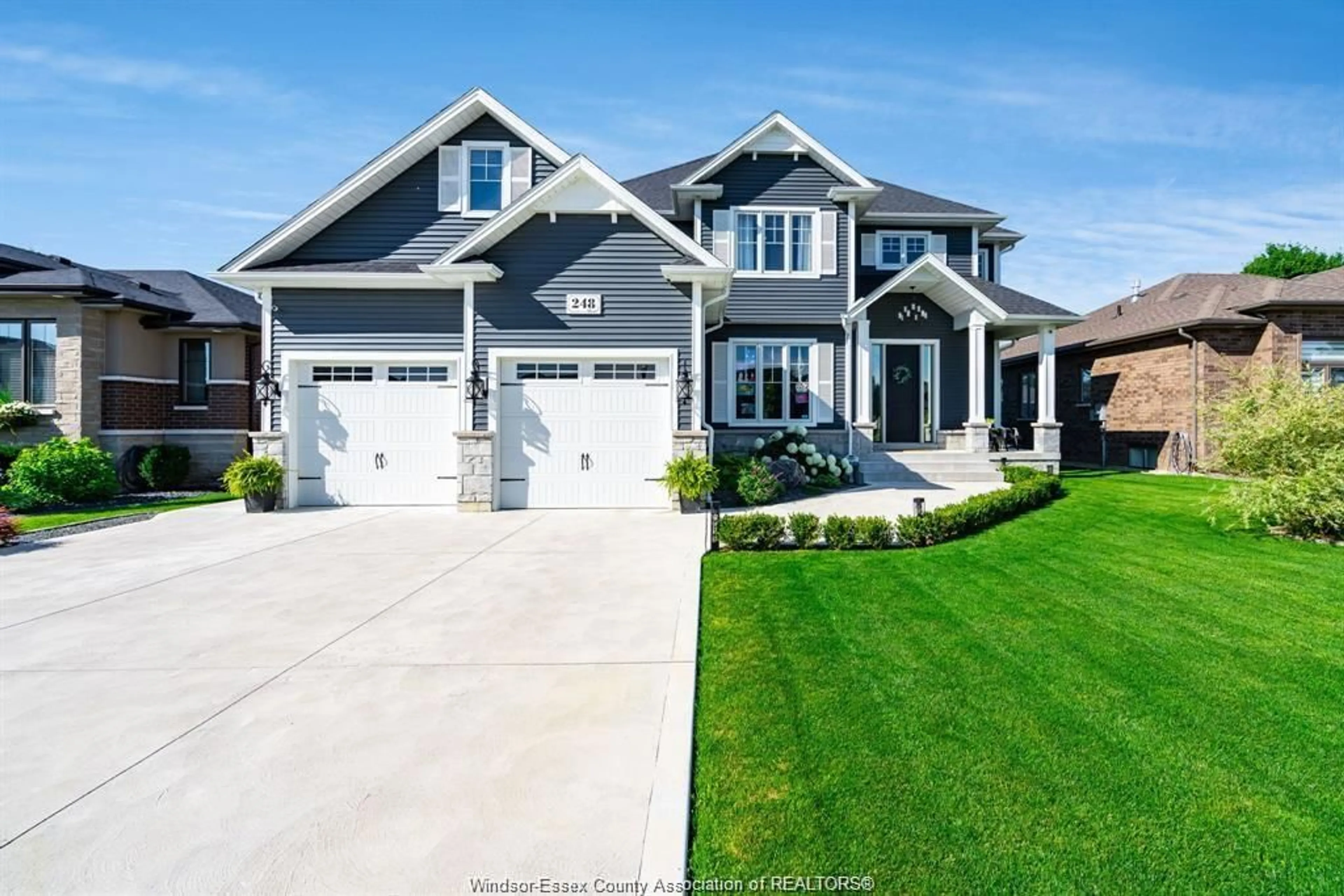 Home with vinyl exterior material, street for 248 JOAN FLOOD, Essex Ontario N8M 3E9