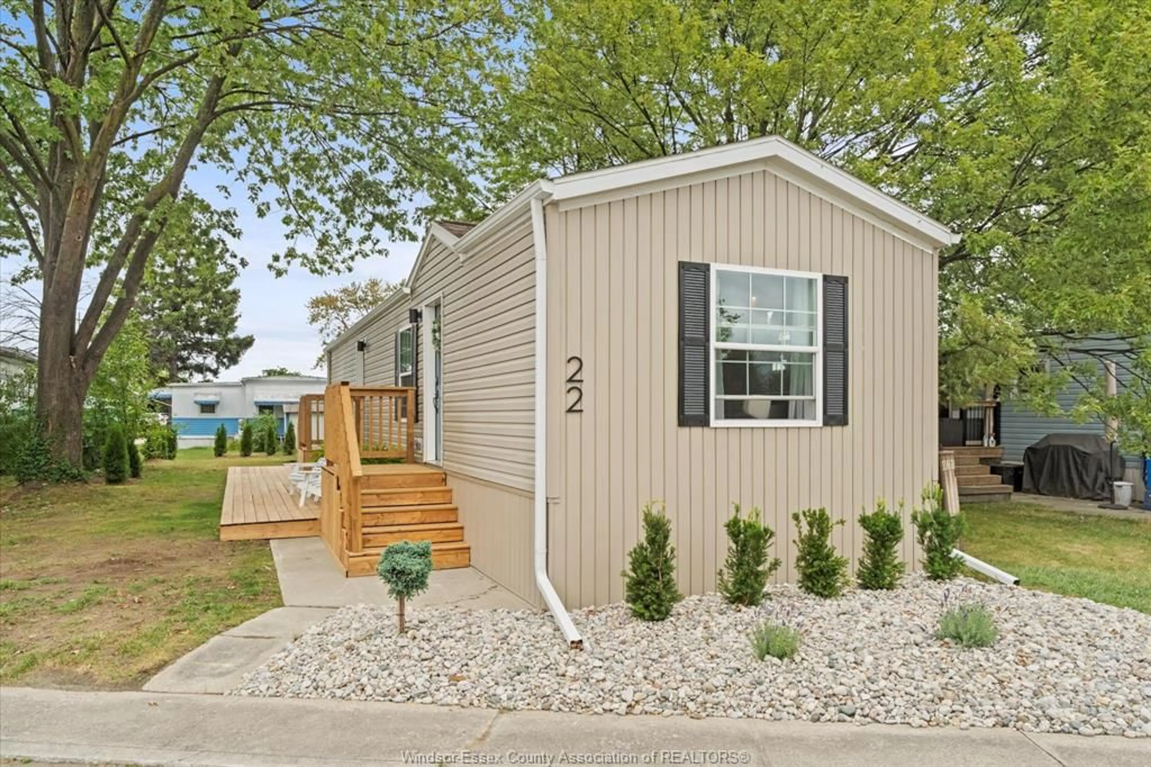 Home with vinyl exterior material, street for 22 LAVINDALE, Lakeshore Ontario N8N 2T2