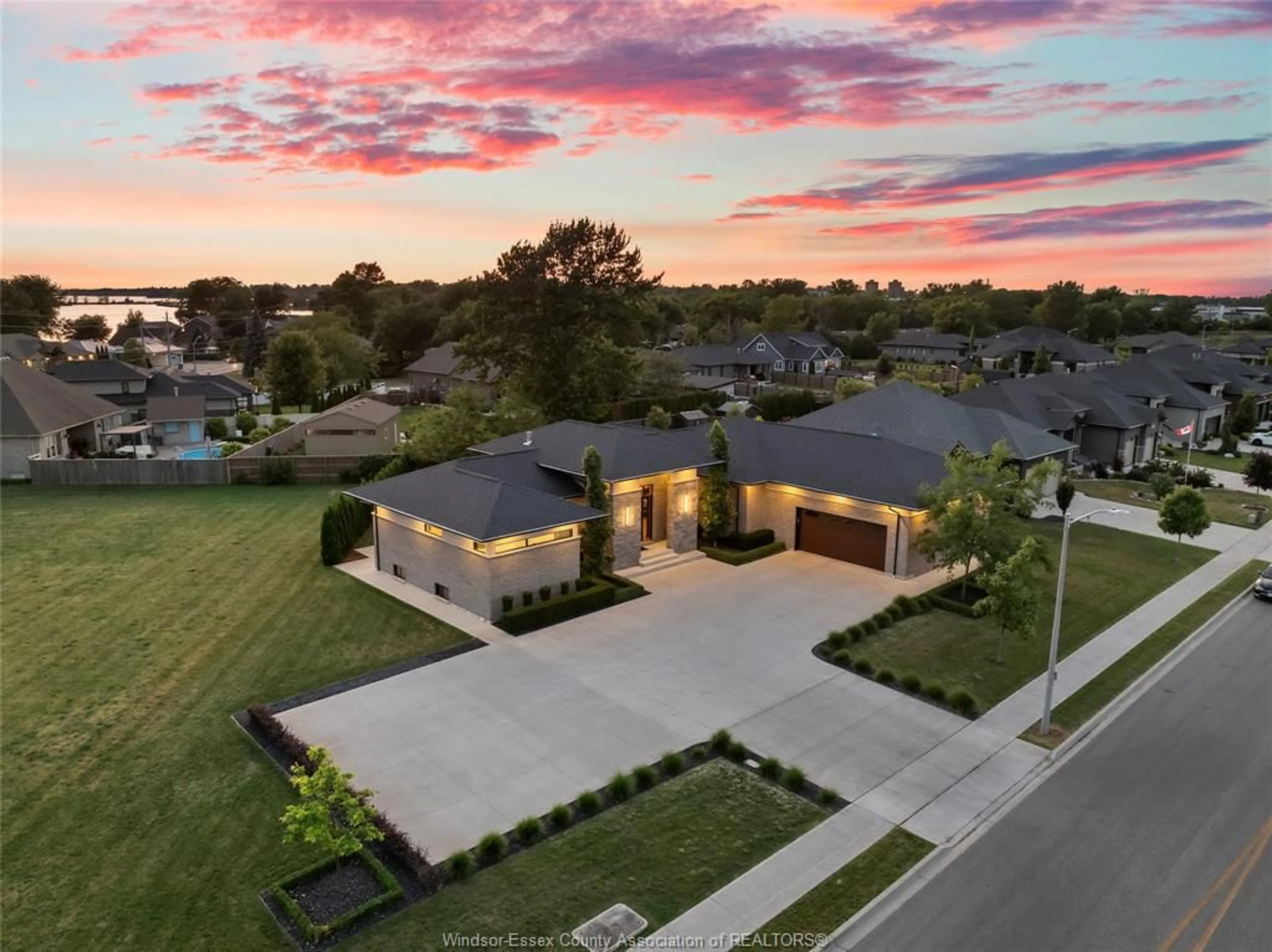 A pic from outside/outdoor area/front of a property/back of a property/a pic from drone, street for 11 DESTINY Dr, Leamington Ontario N8H 0E1