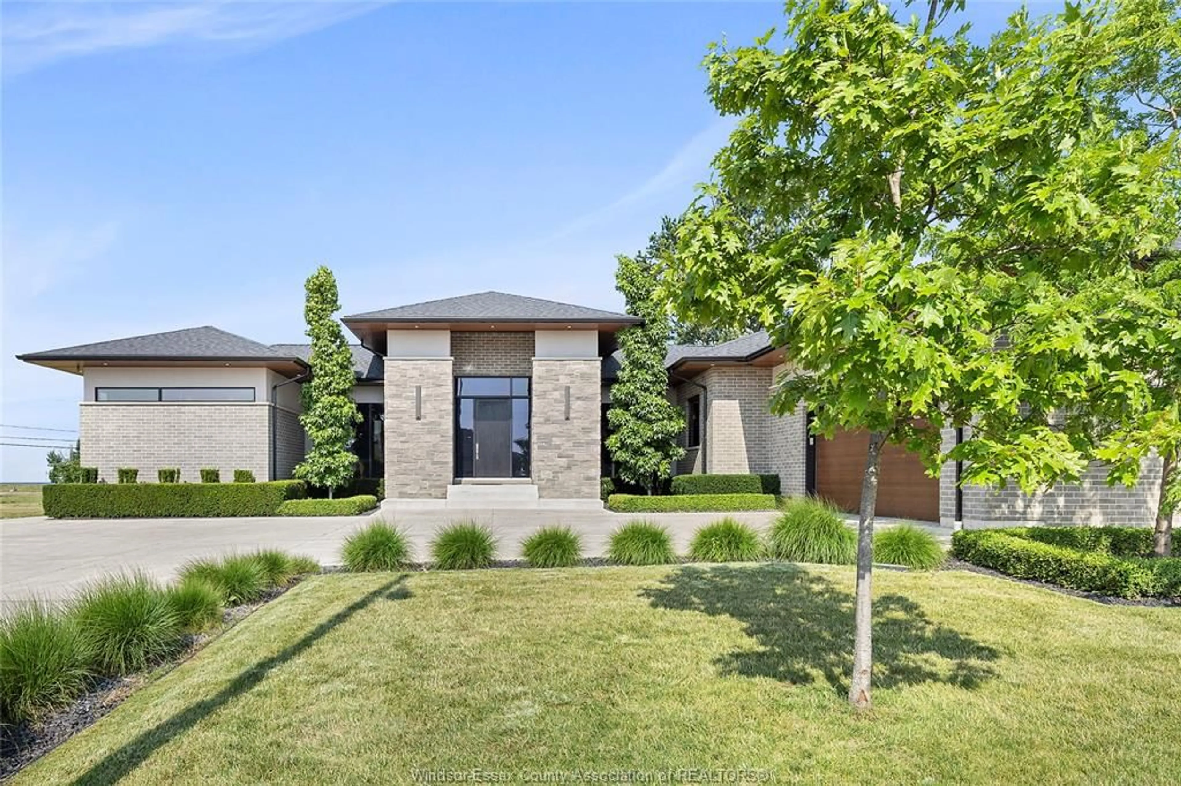 Home with brick exterior material, street for 11 DESTINY Dr, Leamington Ontario N8H 0E1