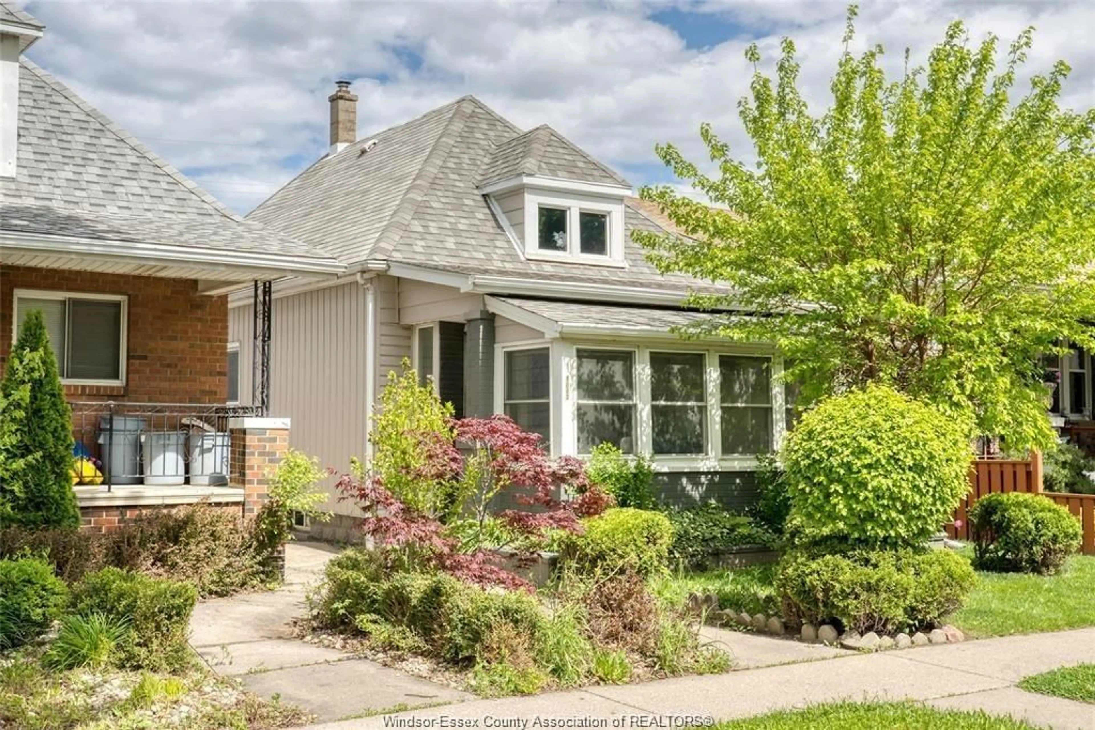 Home with vinyl exterior material, street for 1062 HOWARD Ave, Windsor Ontario N9A 1S7