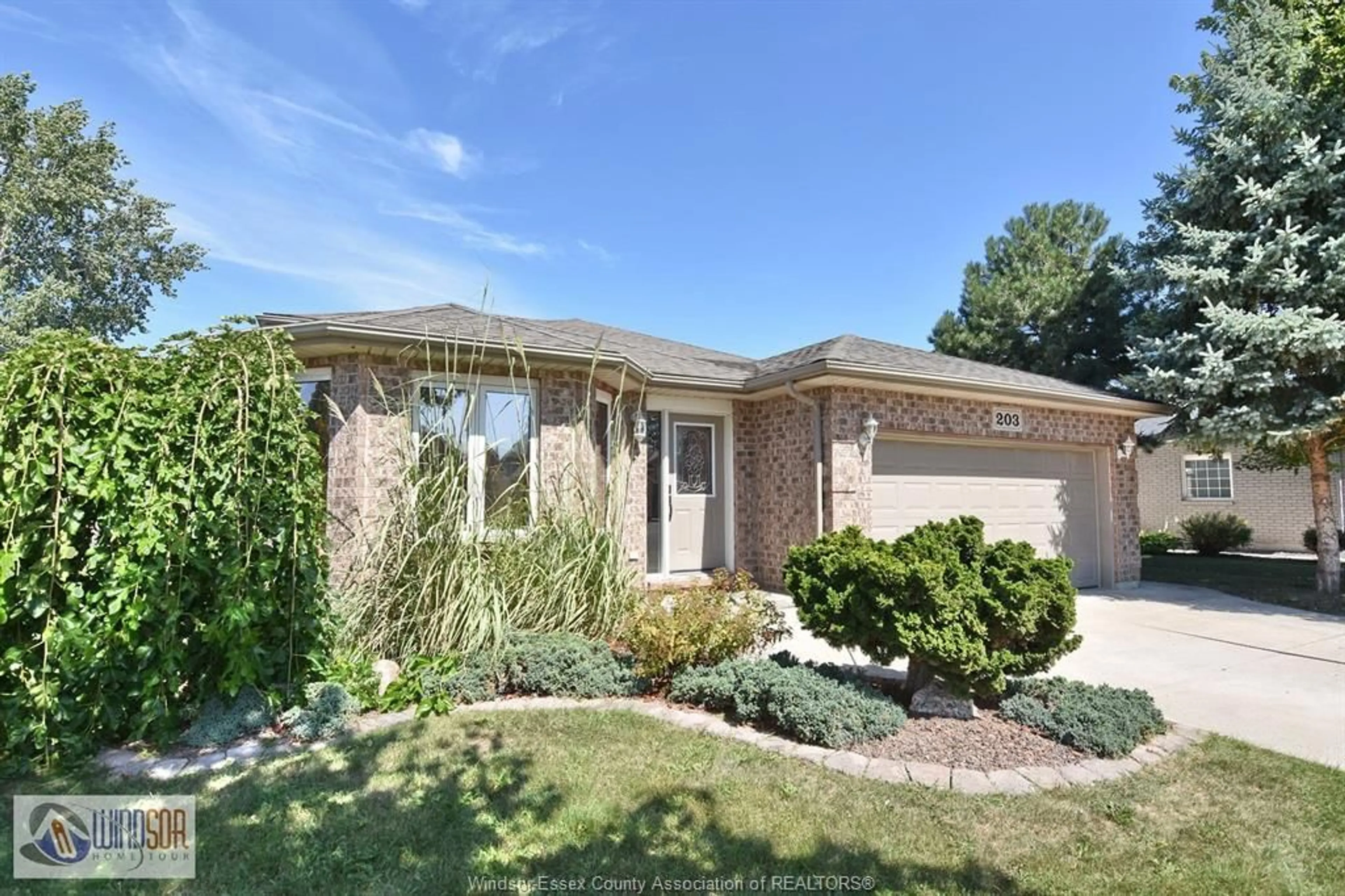 Home with brick exterior material, street for 203 MOUSSEAU, Belle River Ontario N0R 1A0