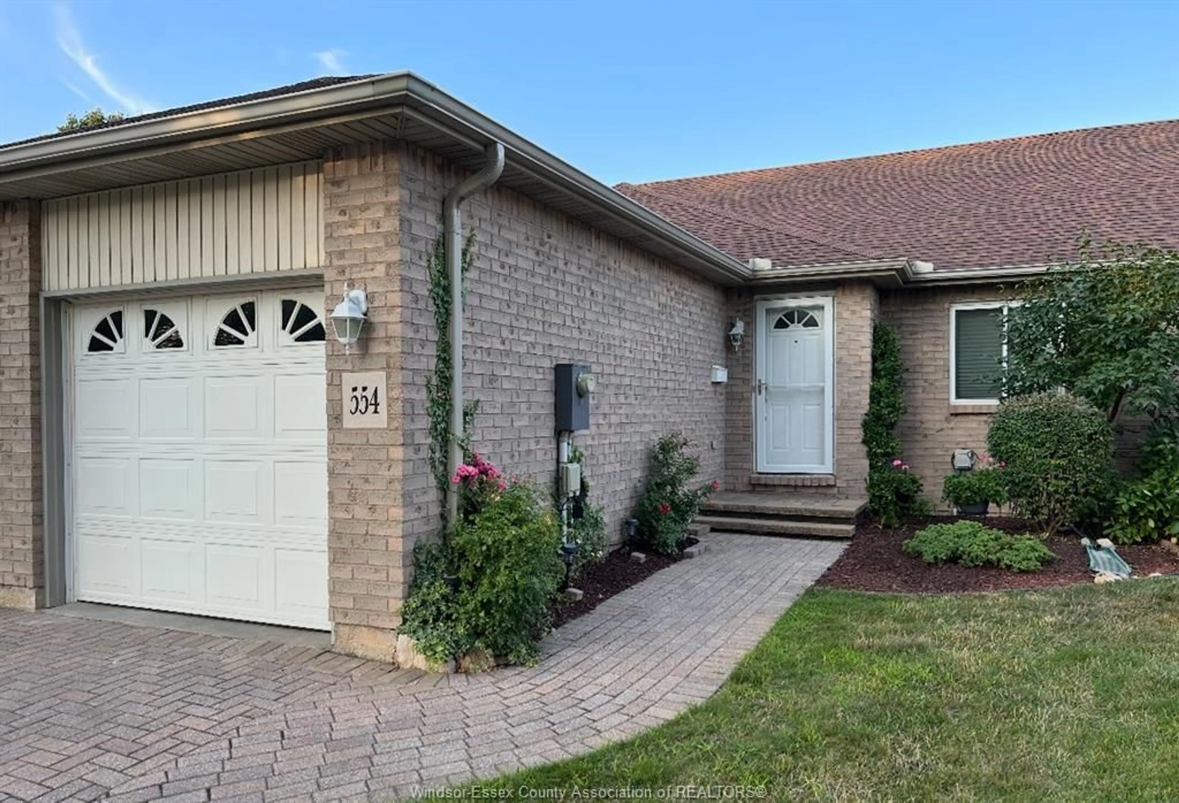 Home with brick exterior material, street for 554 Rodfam Dr, Windsor Ontario N9G 2W1