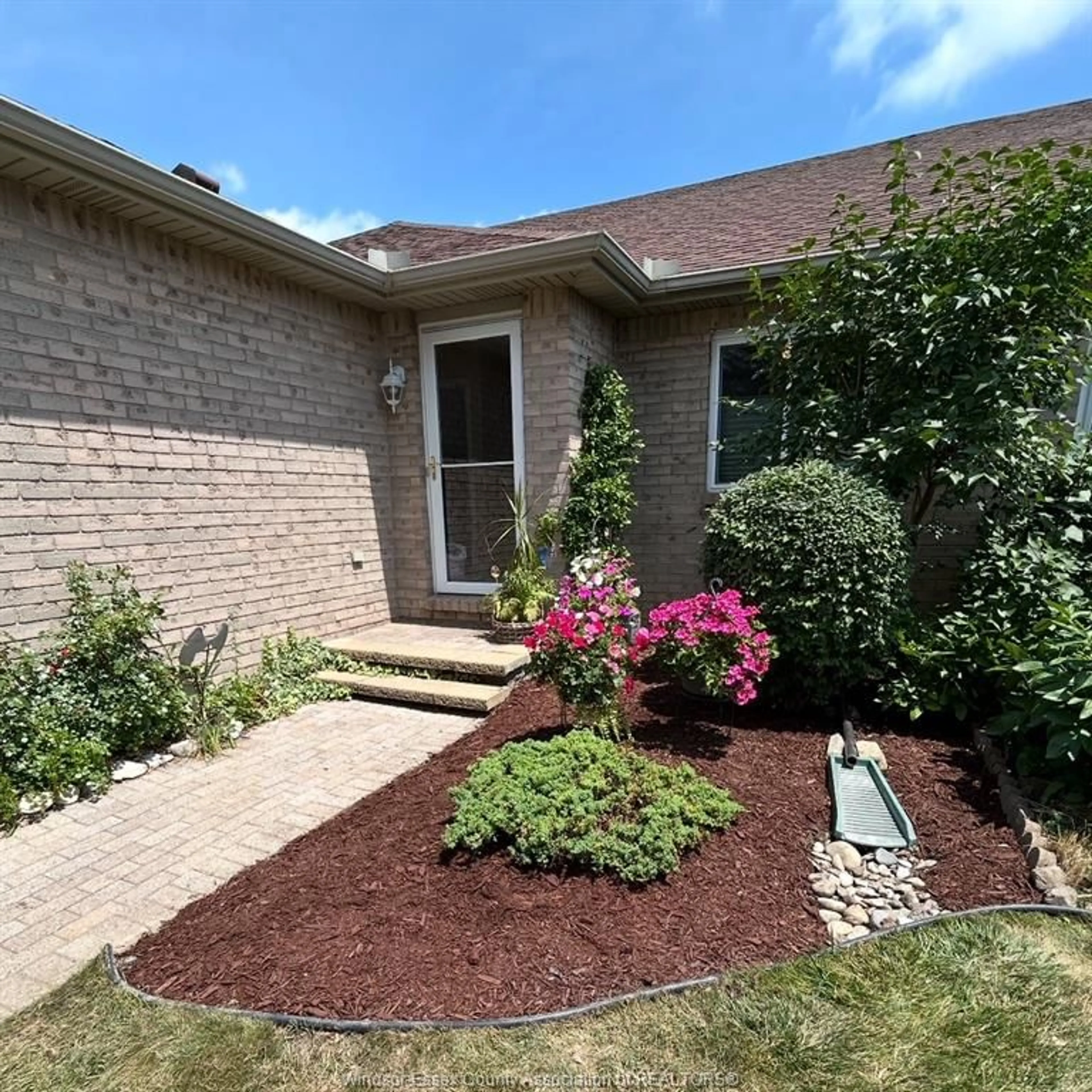 Home with brick exterior material, street for 554 Rodfam Dr, Windsor Ontario N9G 2W1