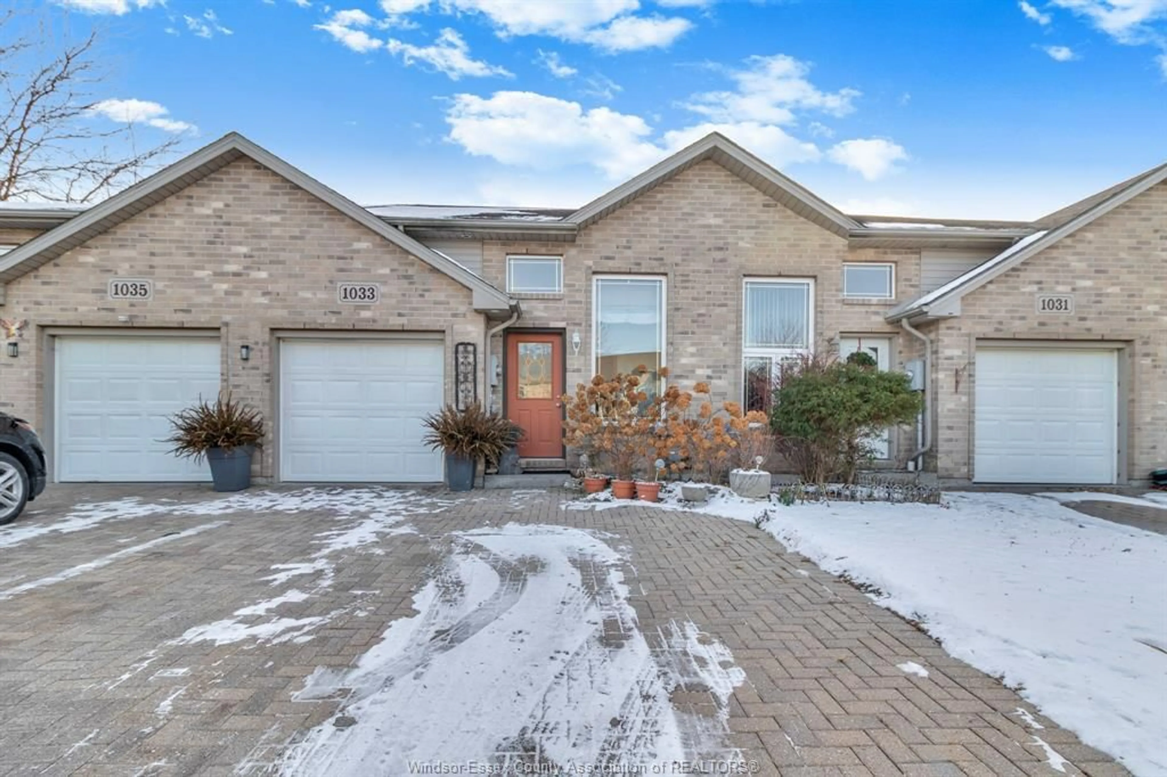 Home with brick exterior material, street for 1033 KING RICHARD Crt, Lakeshore Ontario N8L 0V1