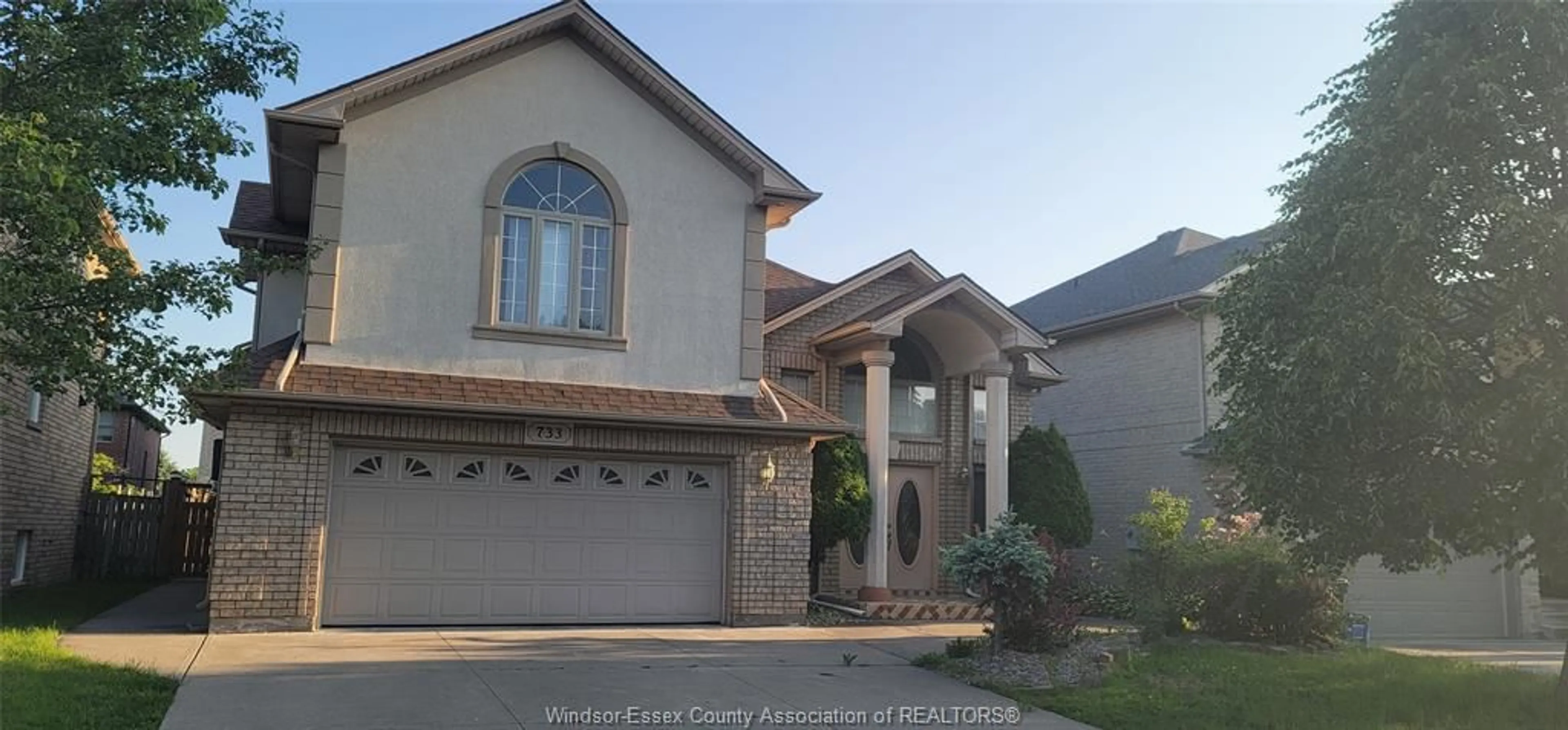 Home with vinyl exterior material, street for 733 MASSIMO Cres, Windsor Ontario N9G 3C7