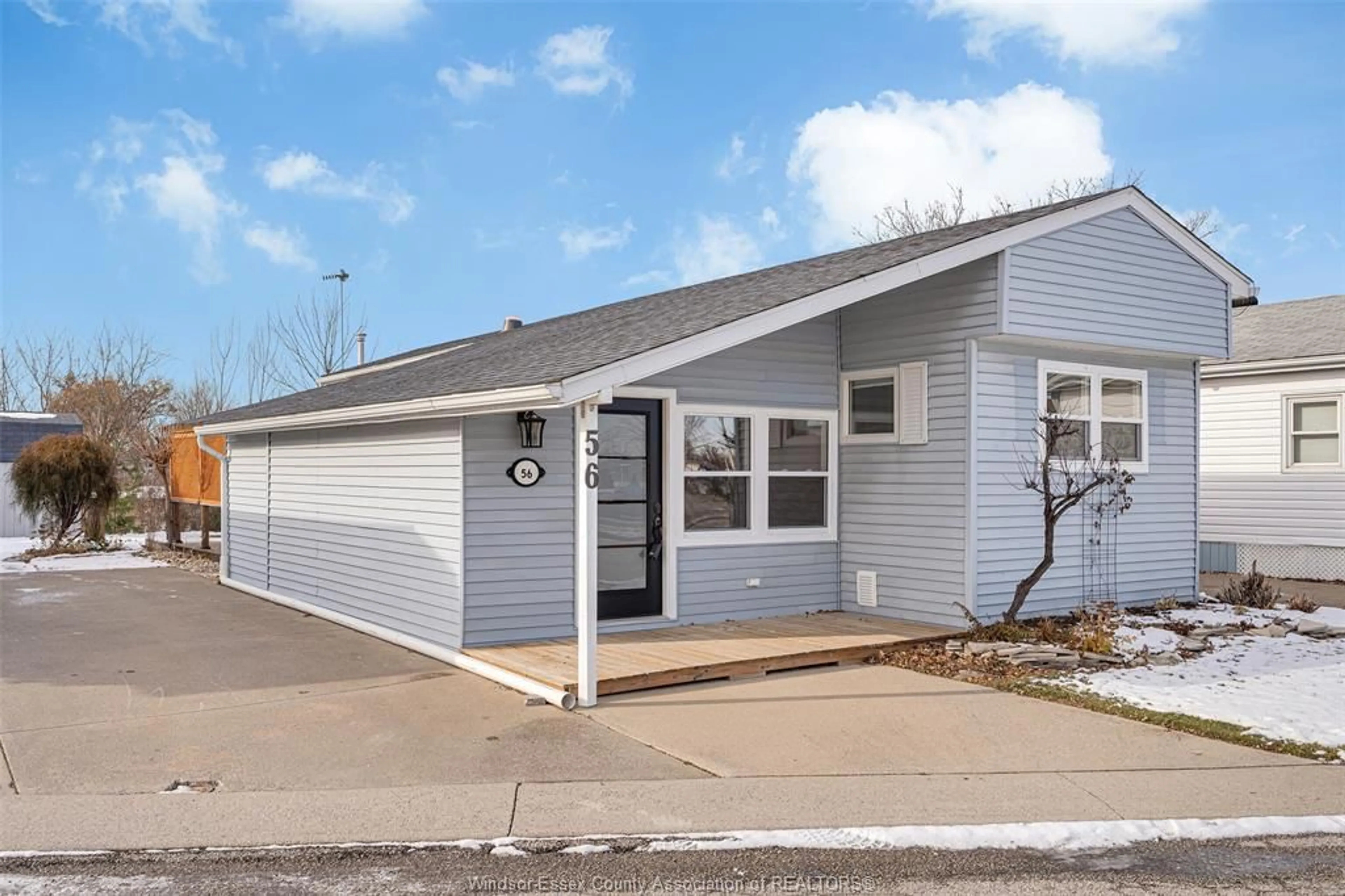 Home with vinyl exterior material, street for 56 PARKSIDE DR, McGregor Ontario N0R 1J0