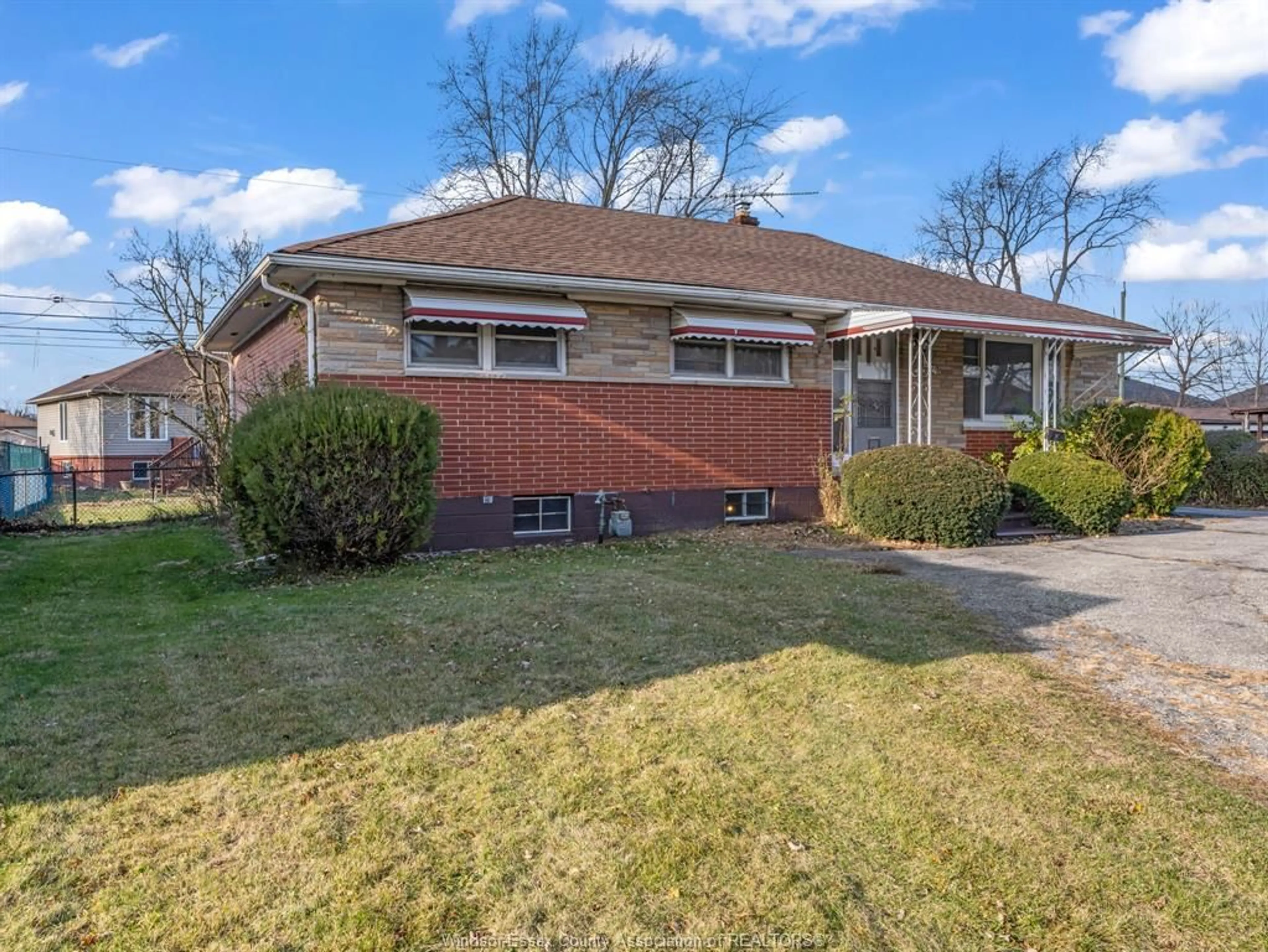 Home with brick exterior material, street for 2101 DOMINION Blvd, Windsor Ontario N9B 3H8
