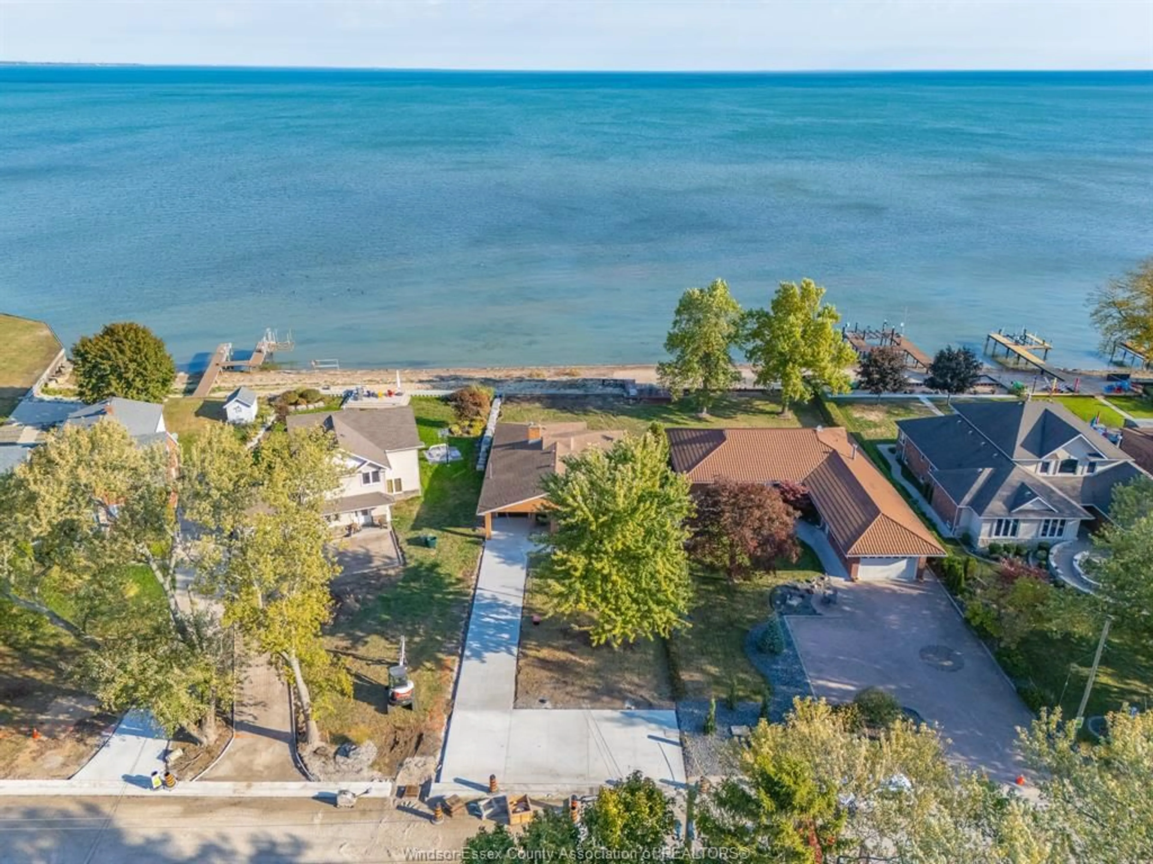 A pic from outside/outdoor area/front of a property/back of a property/a pic from drone, water/lake/river/ocean view for 13918 RIVERSIDE Dr, Tecumseh Ontario N8N 1B6