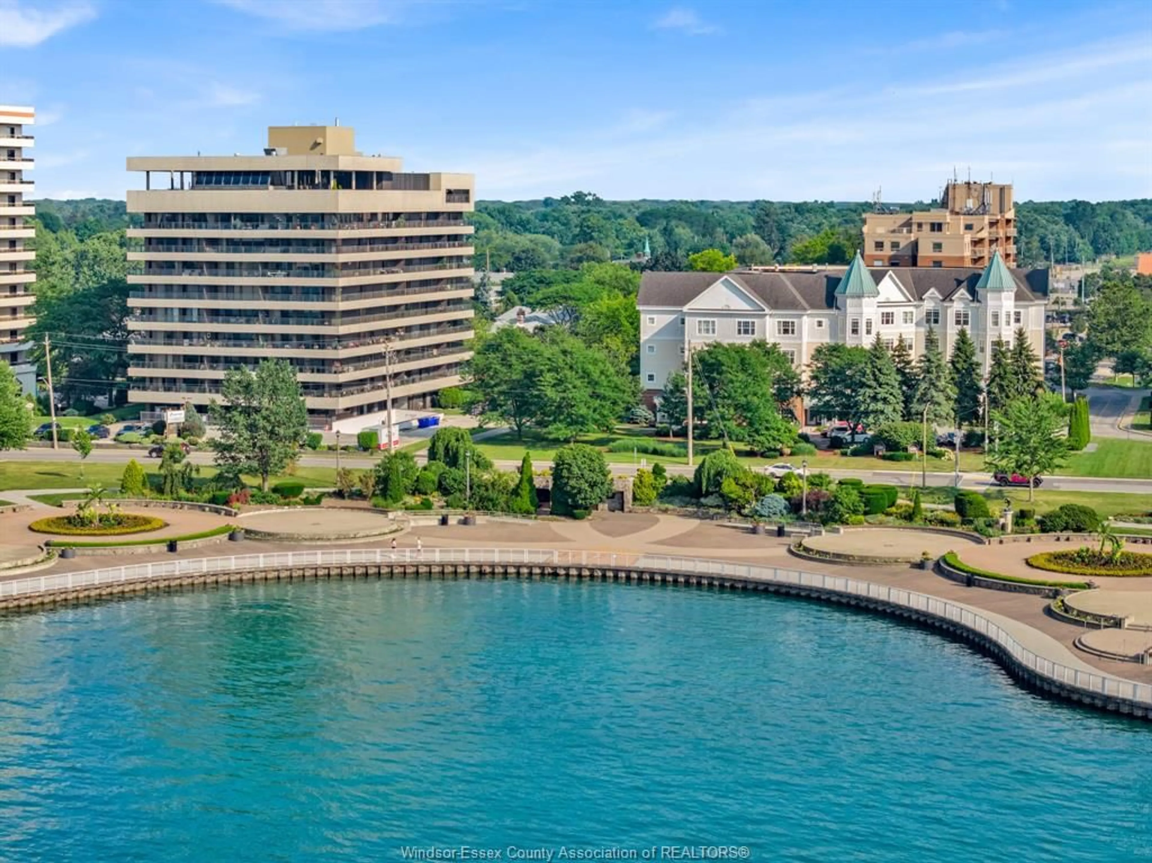 A pic from outside/outdoor area/front of a property/back of a property/a pic from drone, water/lake/river/ocean view for 5125 RIVERSIDE Dr #202, Windsor Ontario N8S 4L8