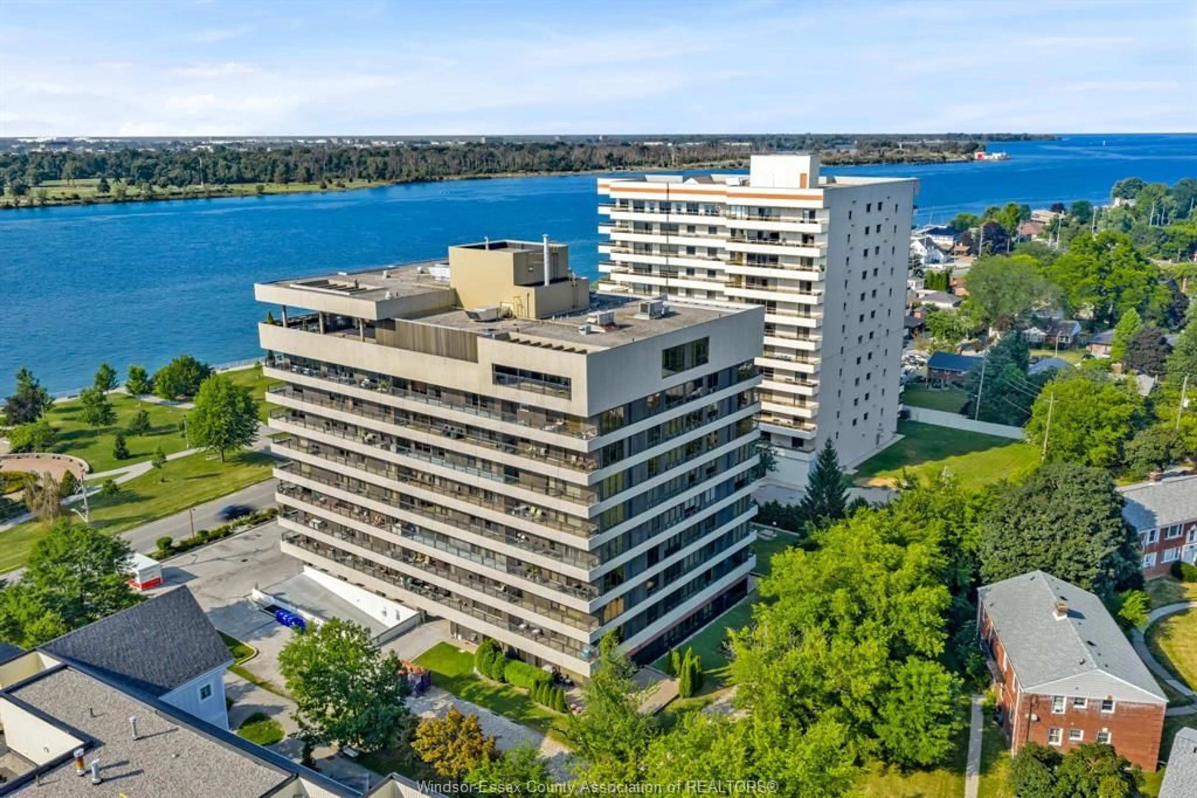 A pic from outside/outdoor area/front of a property/back of a property/a pic from drone, water/lake/river/ocean view for 5125 RIVERSIDE Dr #202, Windsor Ontario N8S 4L8