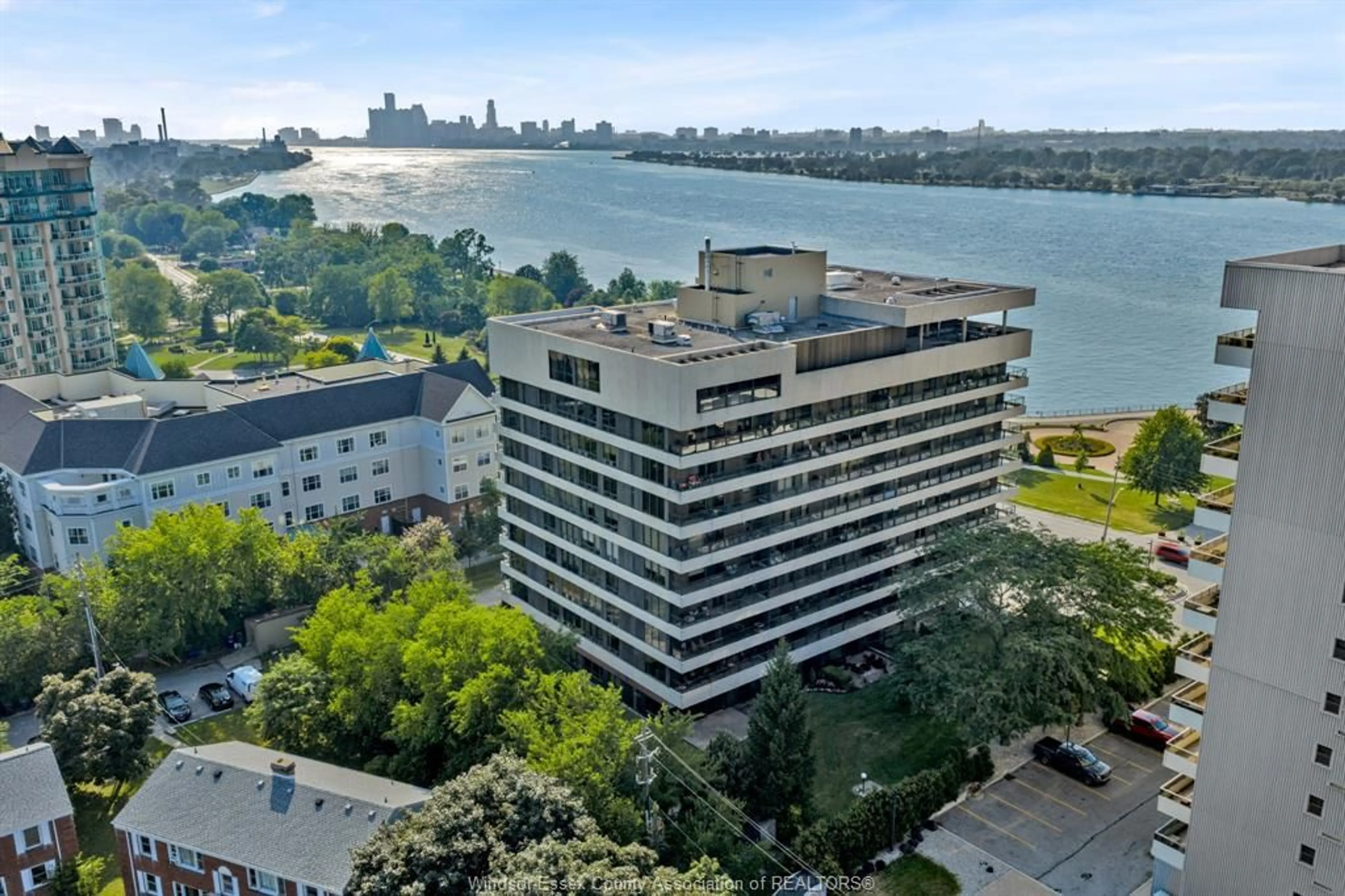 A pic from outside/outdoor area/front of a property/back of a property/a pic from drone, water/lake/river/ocean view for 5125 RIVERSIDE Dr #202, Windsor Ontario N8S 4L8