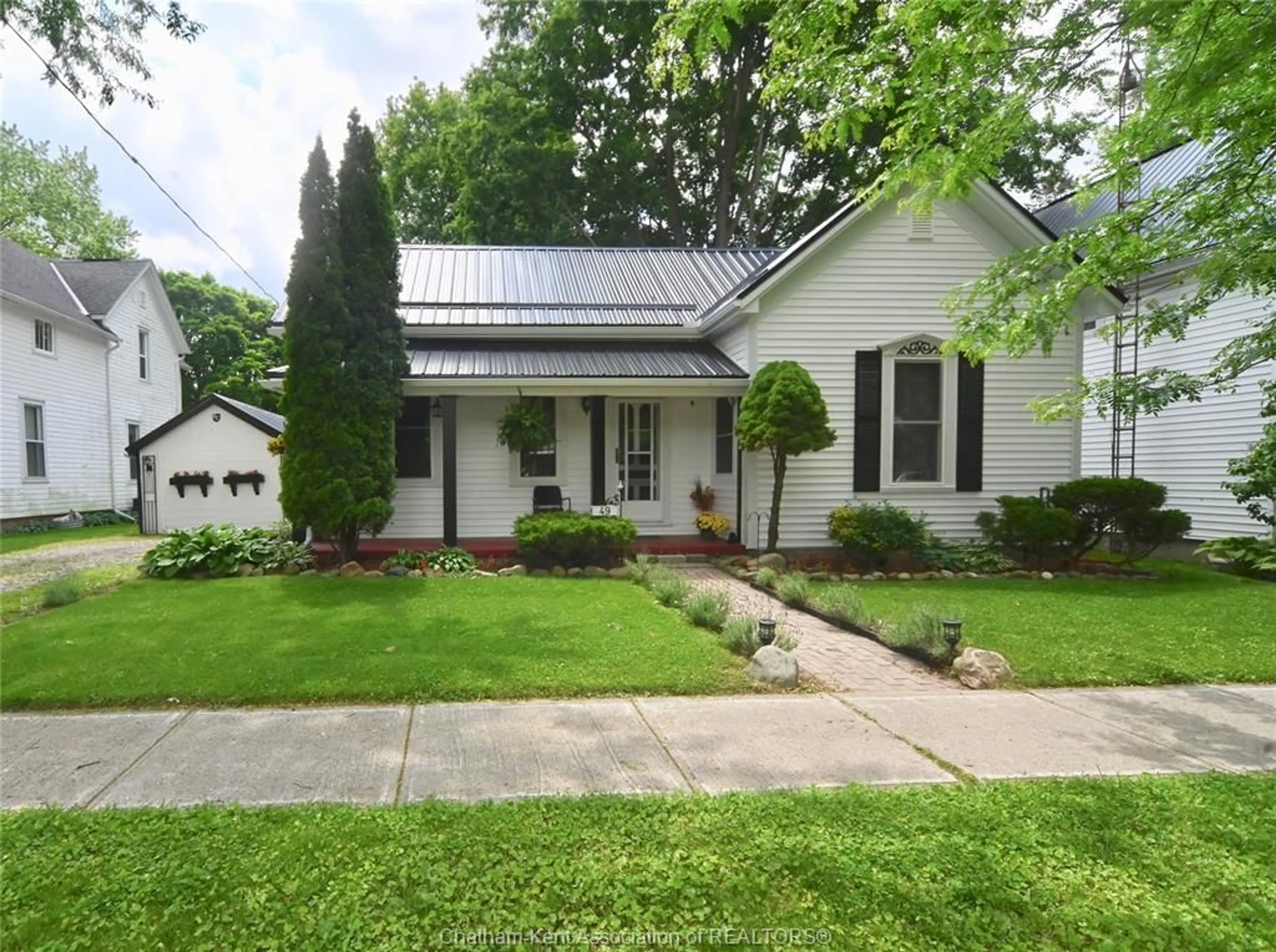 A pic from outside/outdoor area/front of a property/back of a property/a pic from drone, street for 49 Erie St, Ridgetown Ontario N0P 2C0