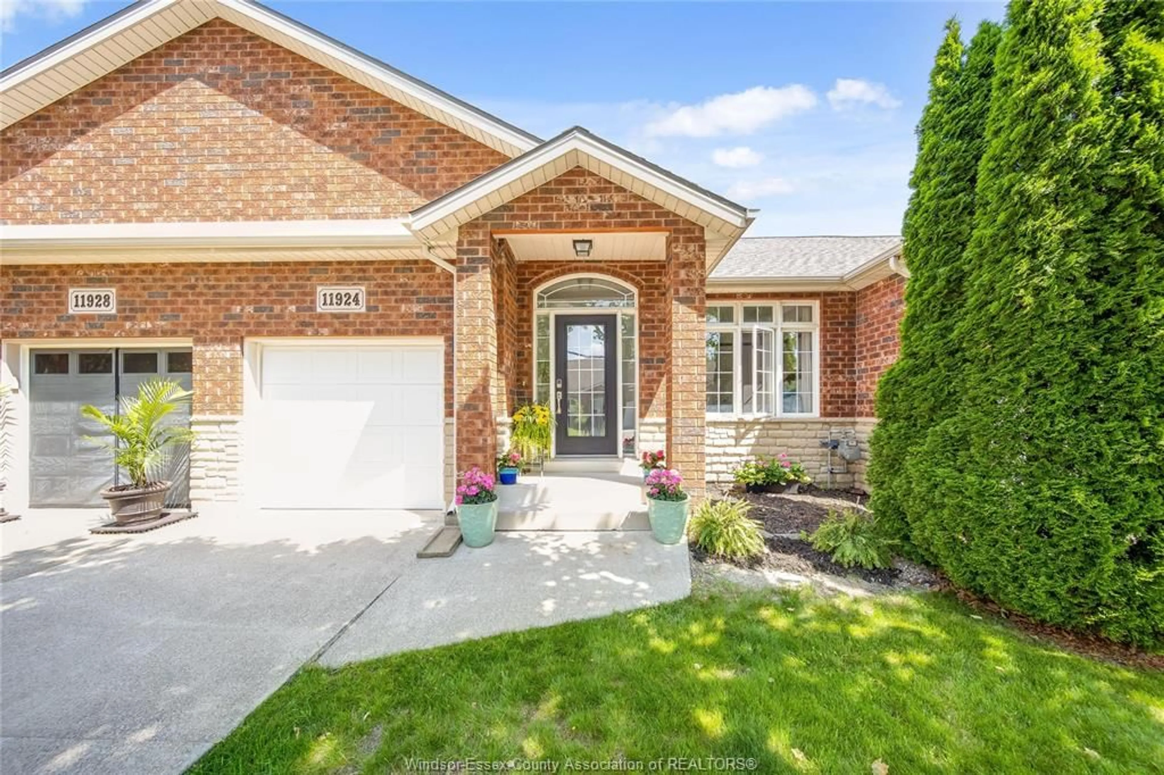 Home with brick exterior material, street for 11924 COBBLESTONE Cres, Windsor Ontario N8P 1T7