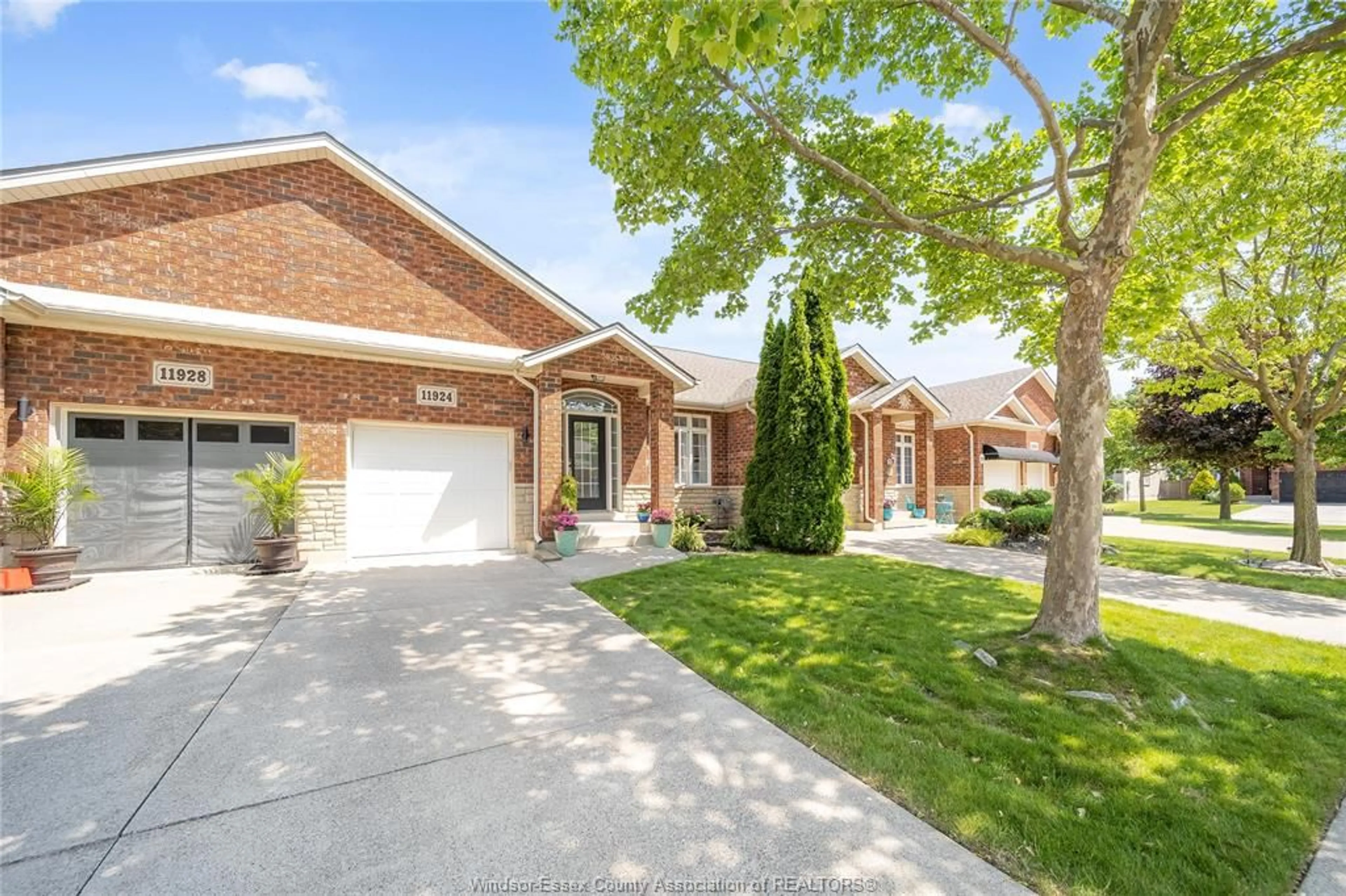 Home with brick exterior material, street for 11924 COBBLESTONE Cres, Windsor Ontario N8P 1T7