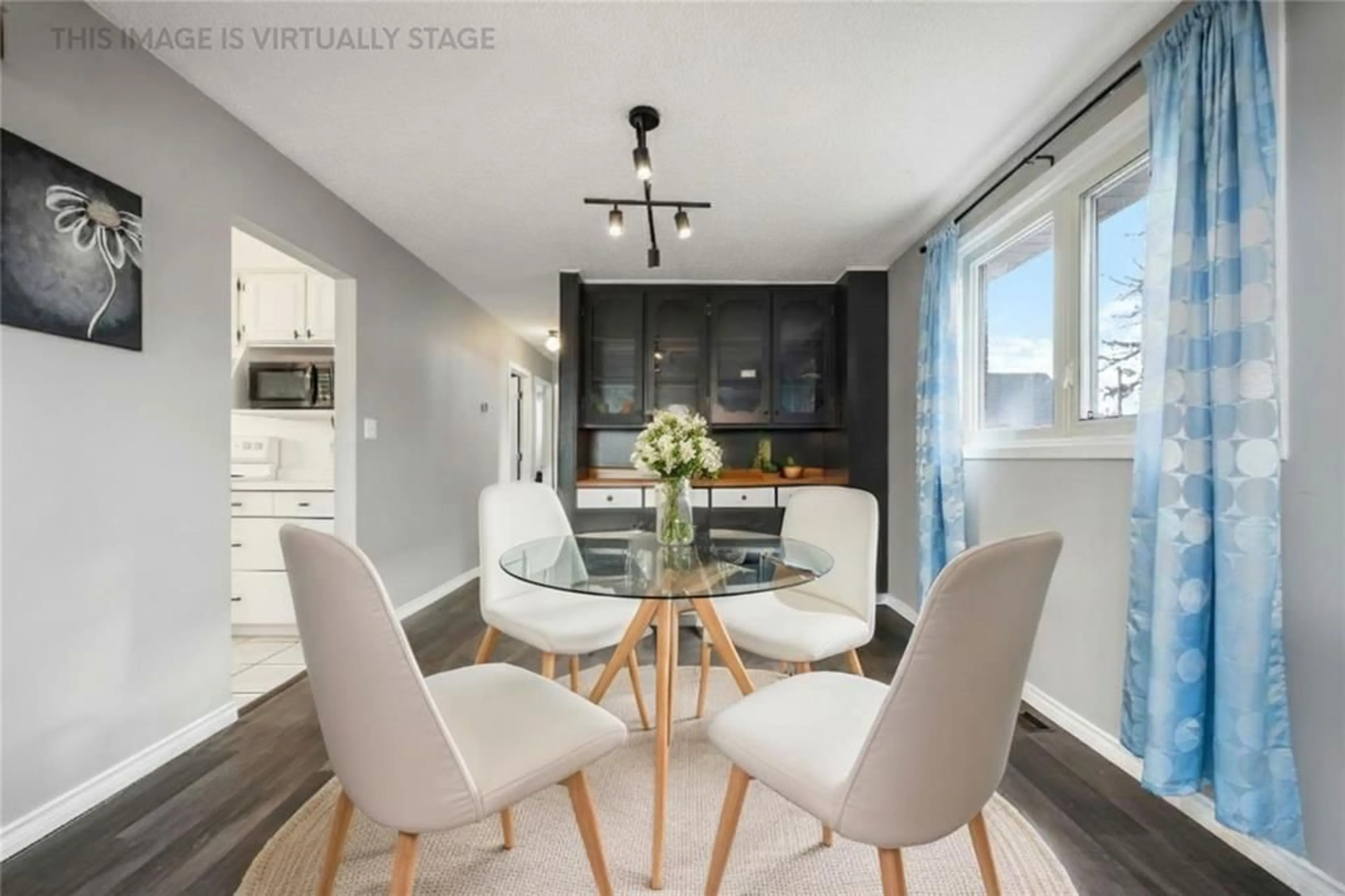 Dining room, wood/laminate floor for 204 MITTON St, Sarnia Ontario N7T 3C9