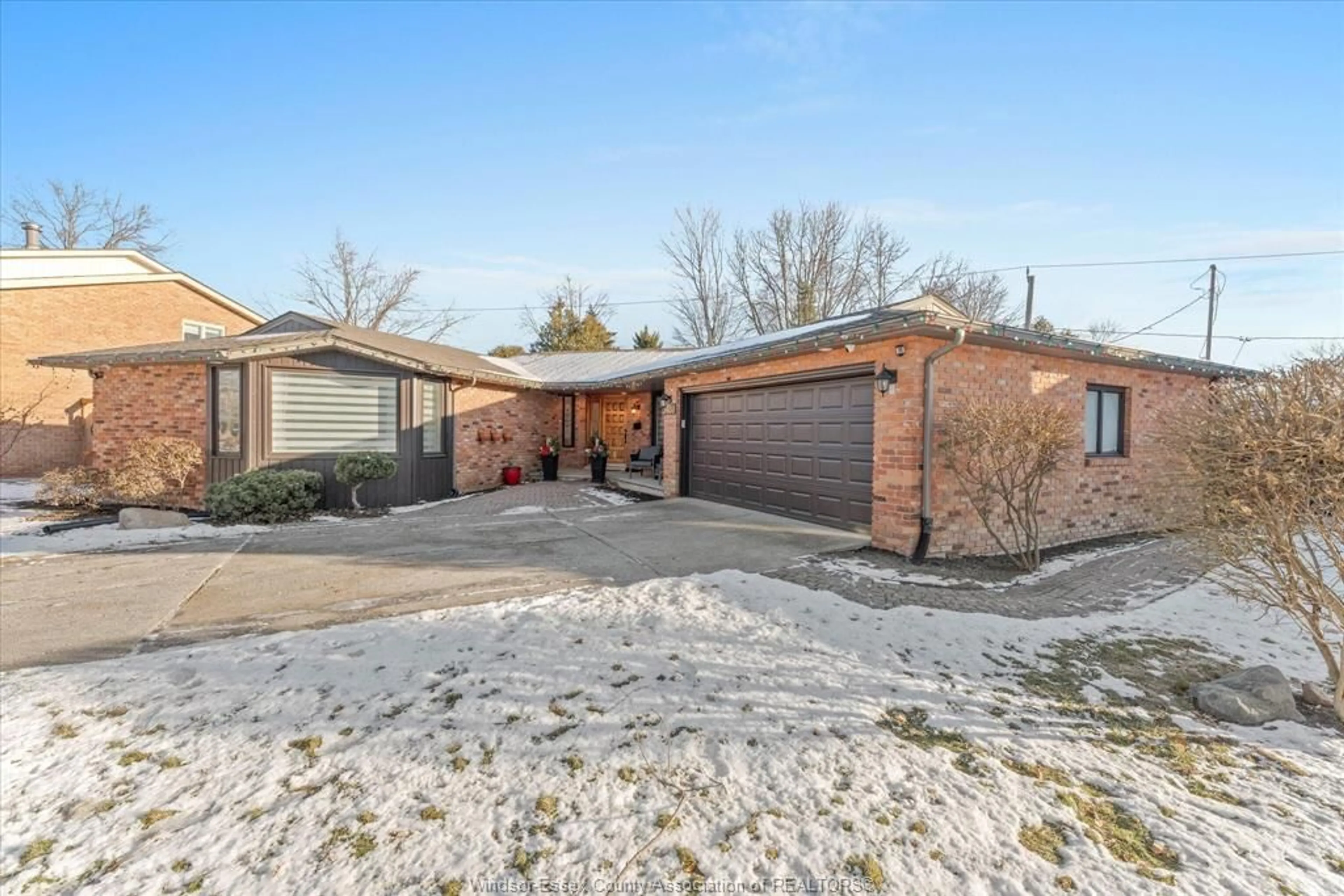 A pic from outside/outdoor area/front of a property/back of a property/a pic from drone, street for 3480 Ouellette Ave, Windsor Ontario N9E 3L9