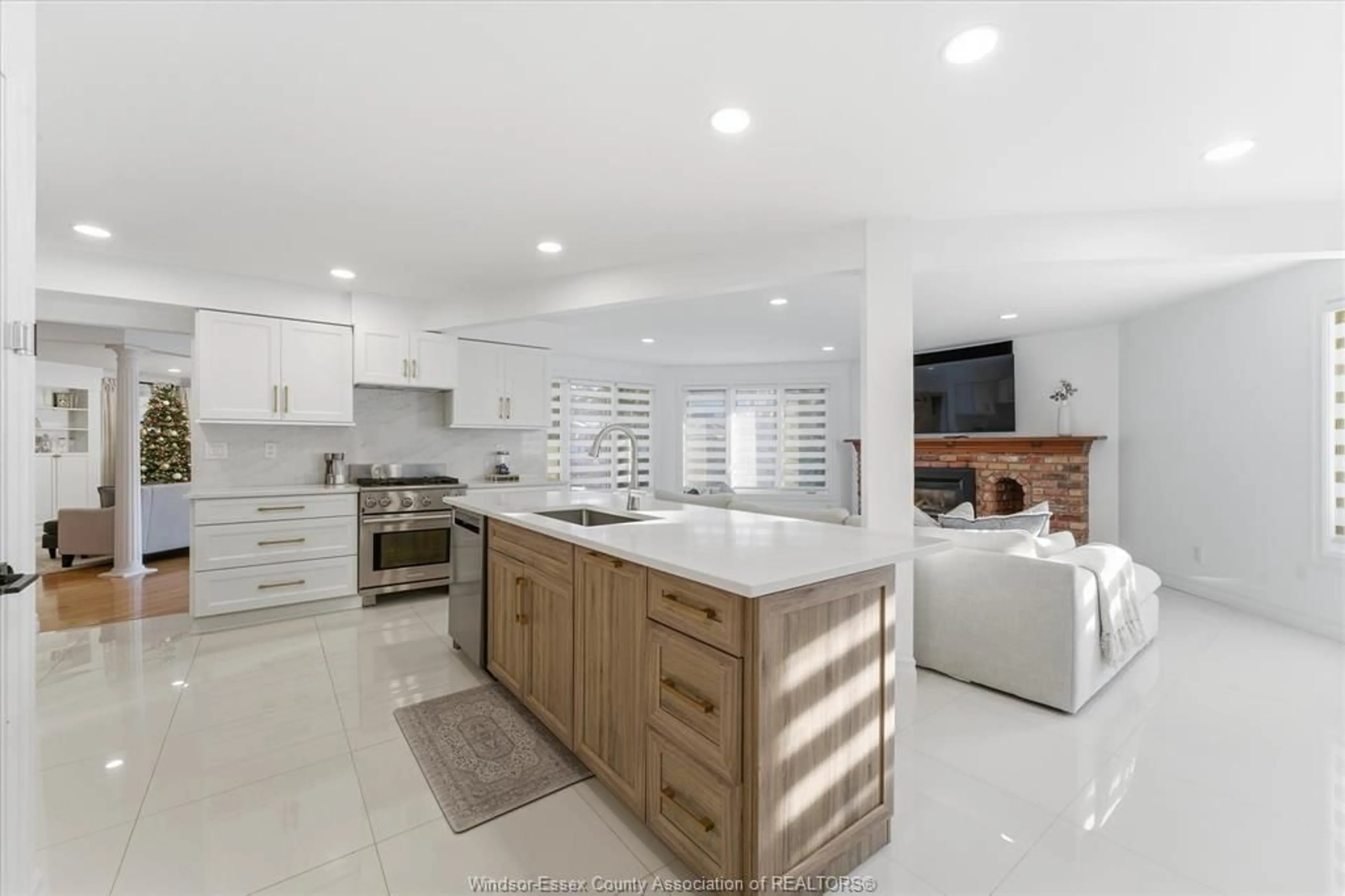 Open concept kitchen, ceramic/tile floor for 3480 Ouellette Ave, Windsor Ontario N9E 3L9