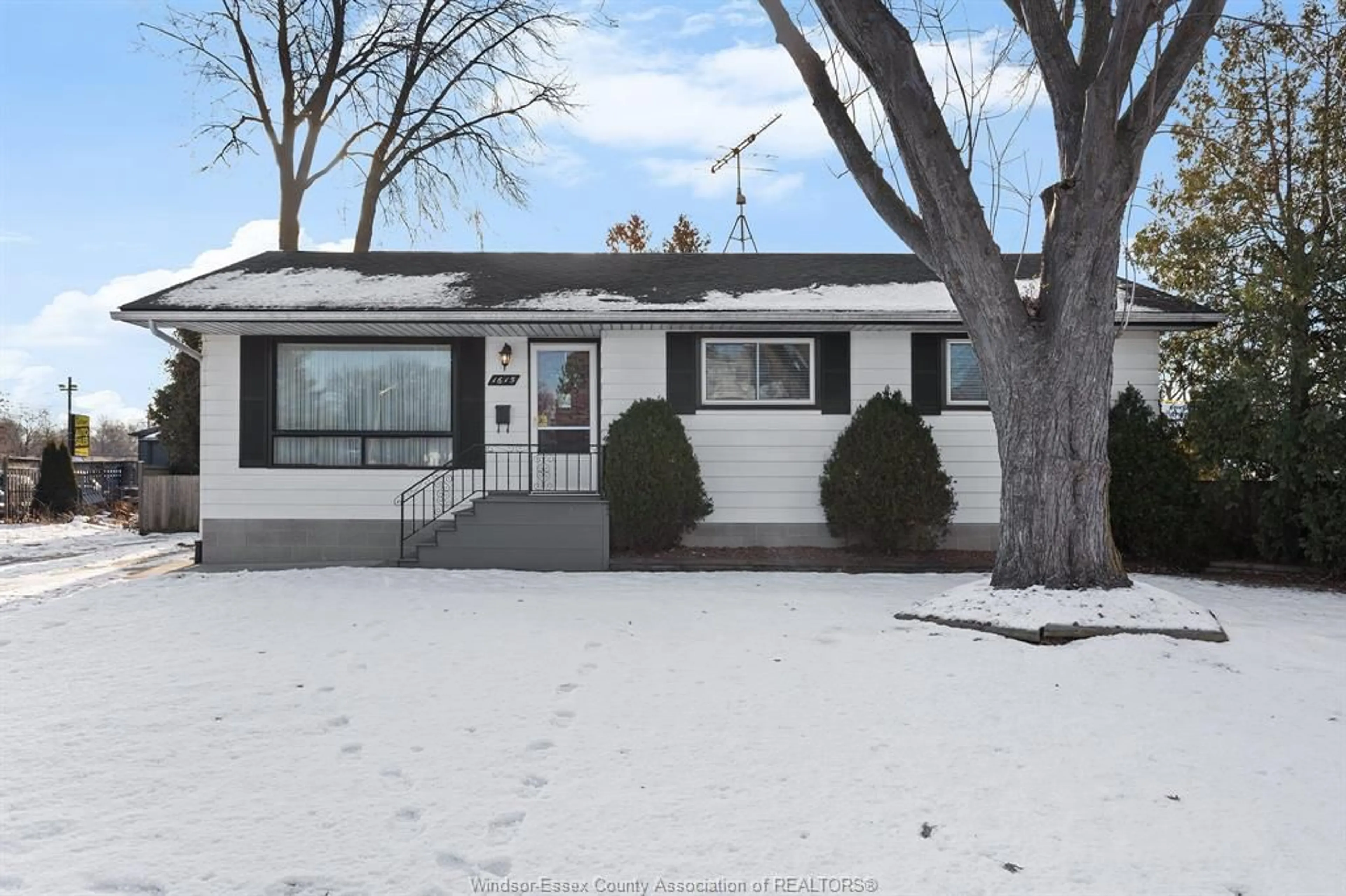 Home with vinyl exterior material, street for 1615 Leduc, Windsor Ontario N9B 1S9