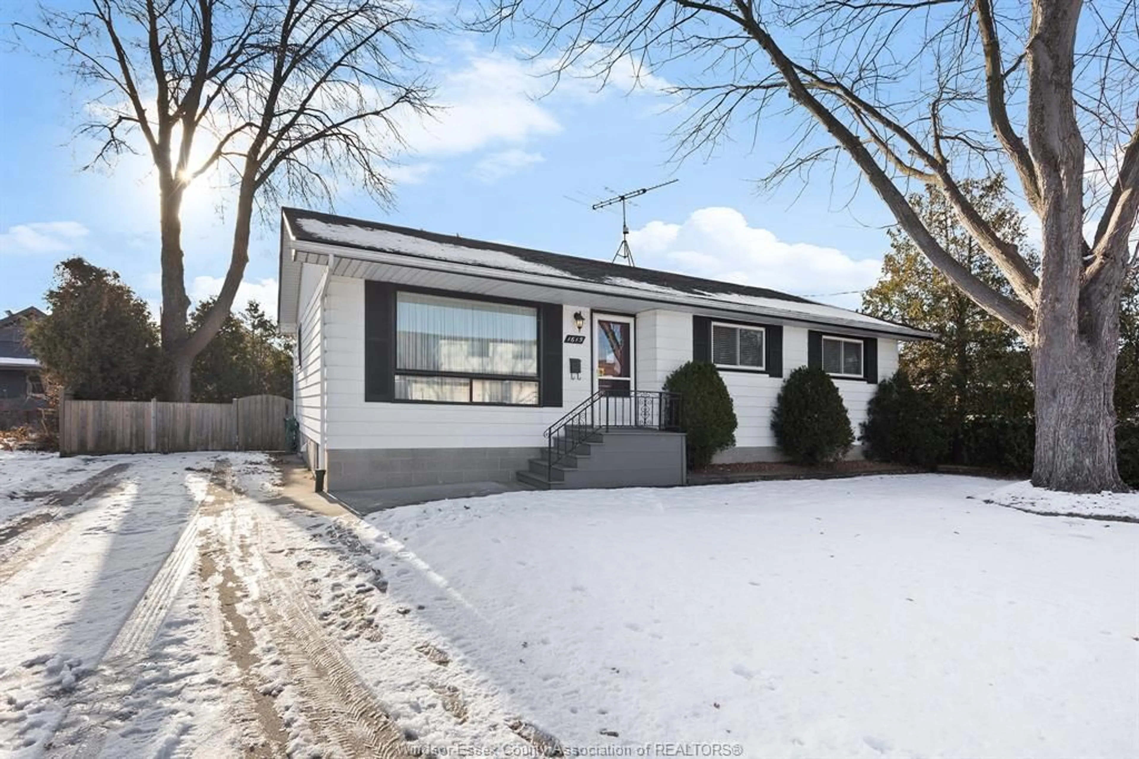 Home with vinyl exterior material, street for 1615 Leduc, Windsor Ontario N9B 1S9