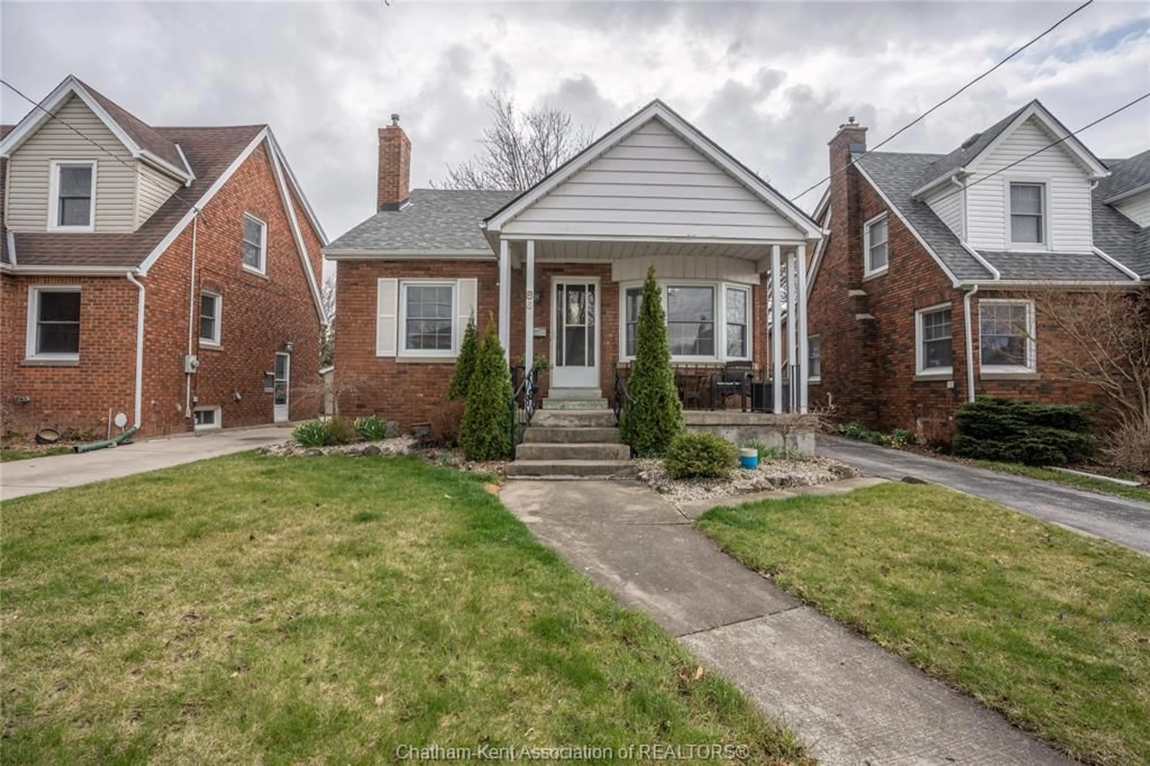 Home with brick exterior material, street for 86 Phyllis Ave, Chatham Ontario N7M 3C4
