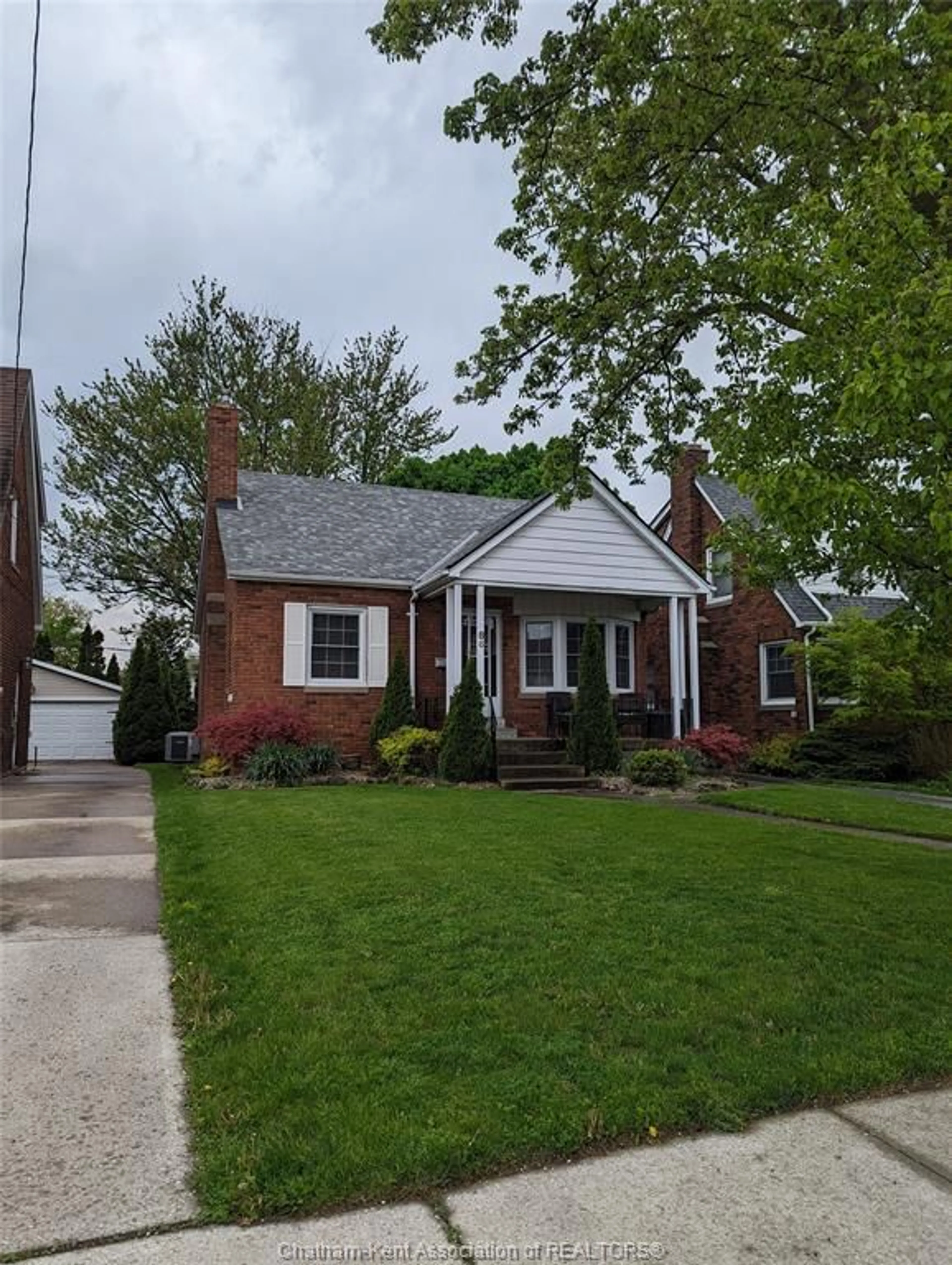 Home with brick exterior material, street for 86 Phyllis Ave, Chatham Ontario N7M 3C4