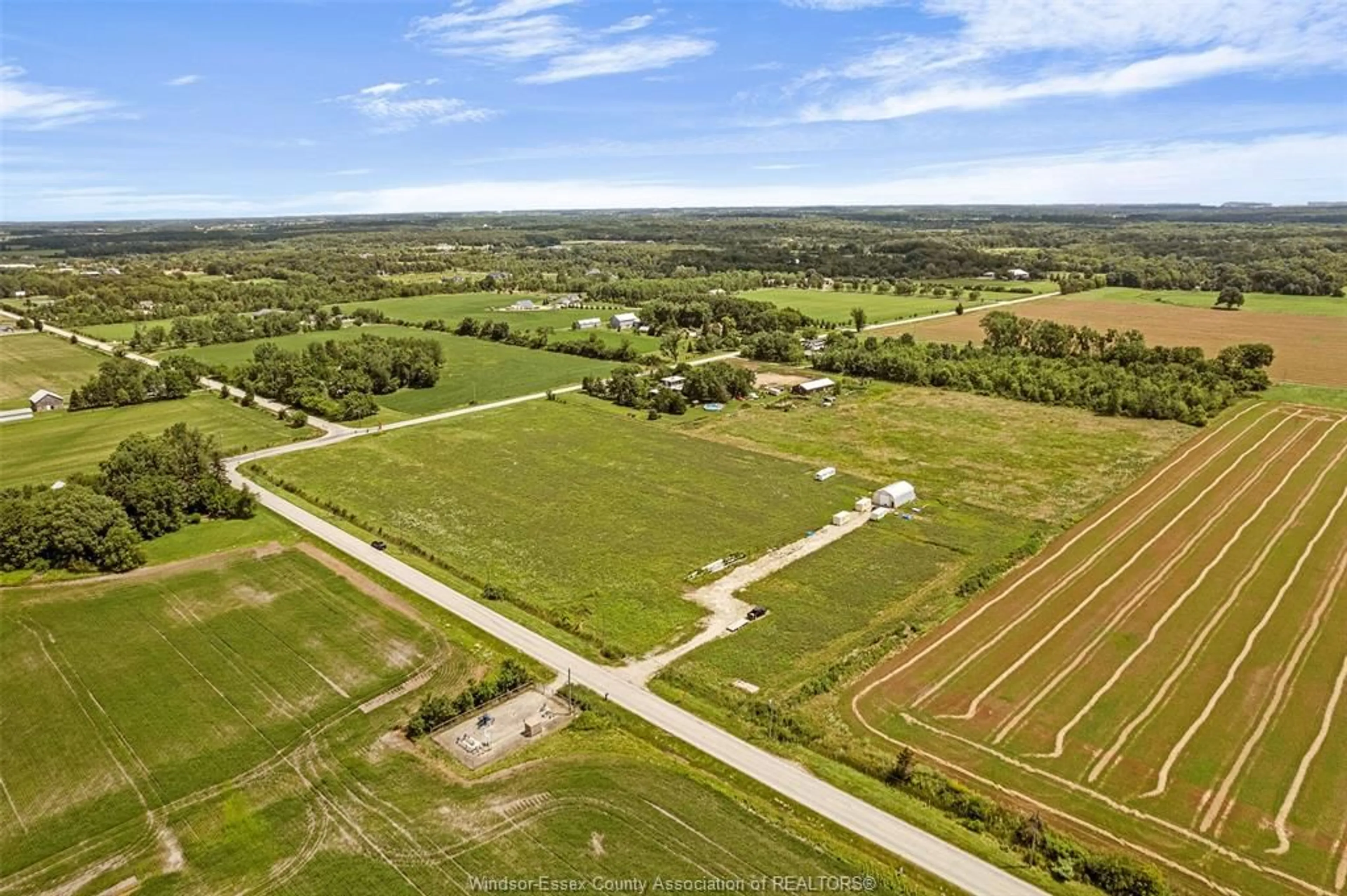 A pic from outside/outdoor area/front of a property/back of a property/a pic from drone, unknown for 2500 MCCORMICK Rd, Harrow Ontario N0R 1G0