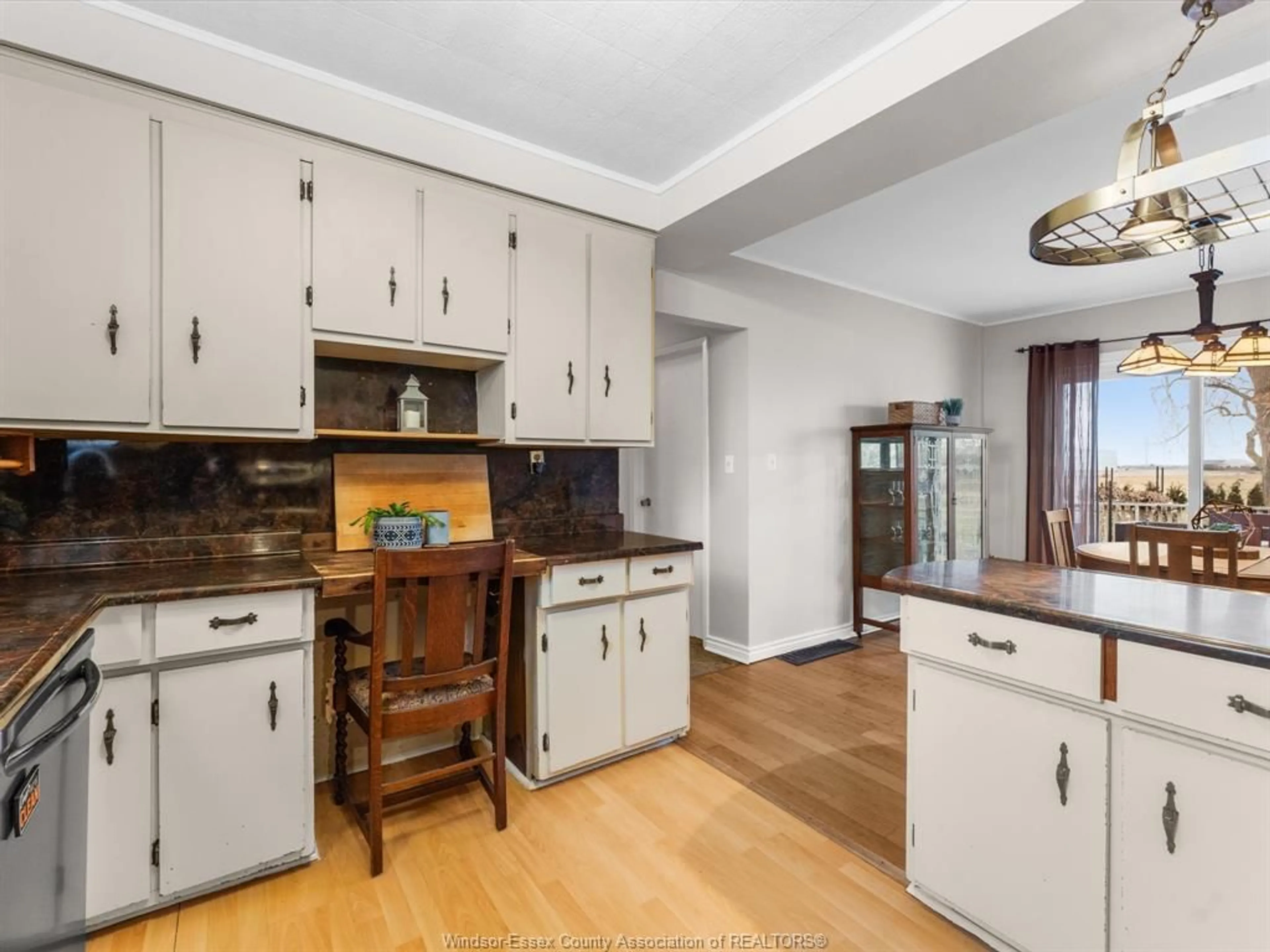 Open concept kitchen, wood/laminate floor for 1175 Highway 77, Leamington Ontario N0P 2J0