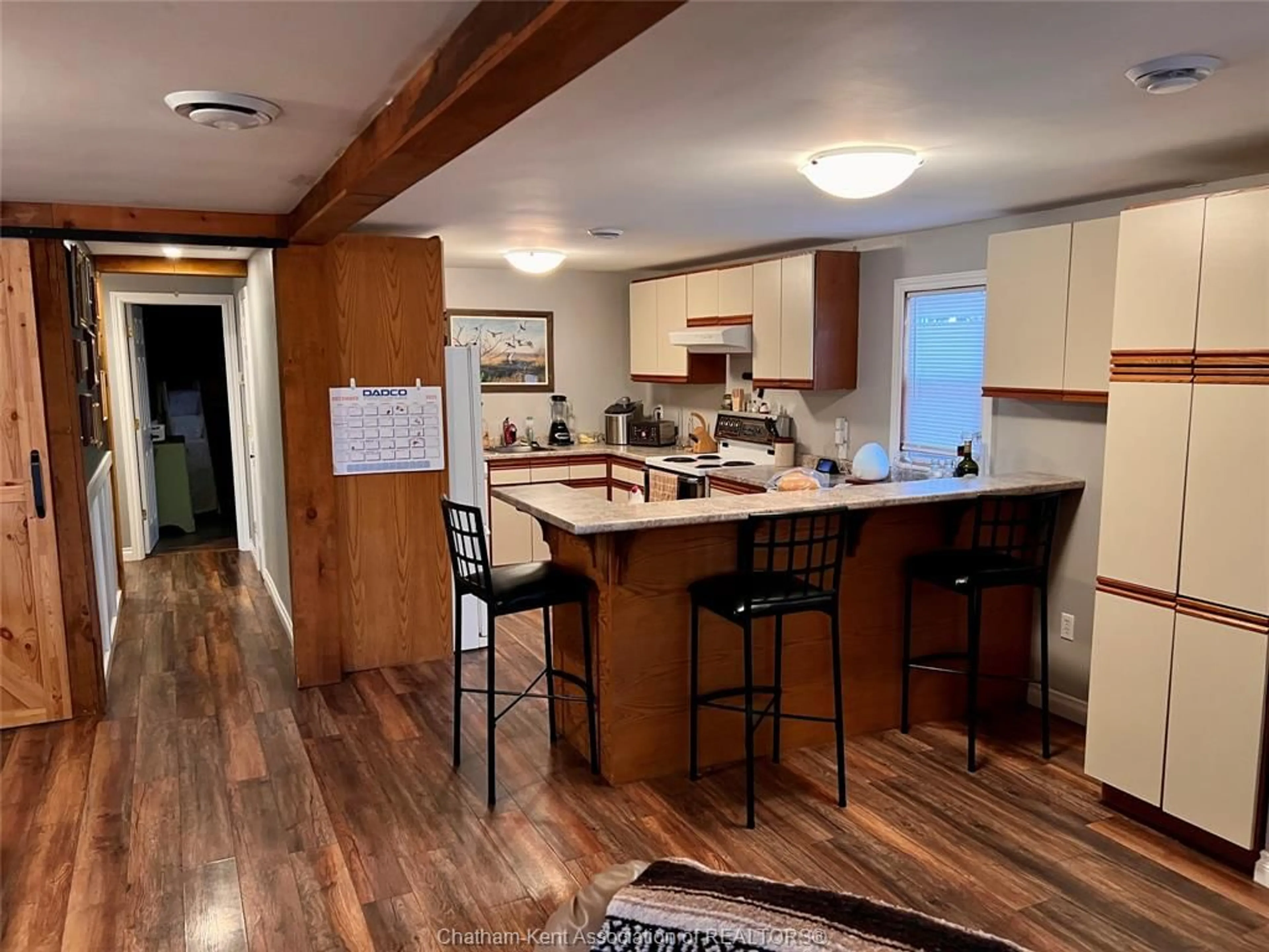 Open concept kitchen, wood/laminate floor for 8583 James St, Charing Cross Ontario N0P 1G0