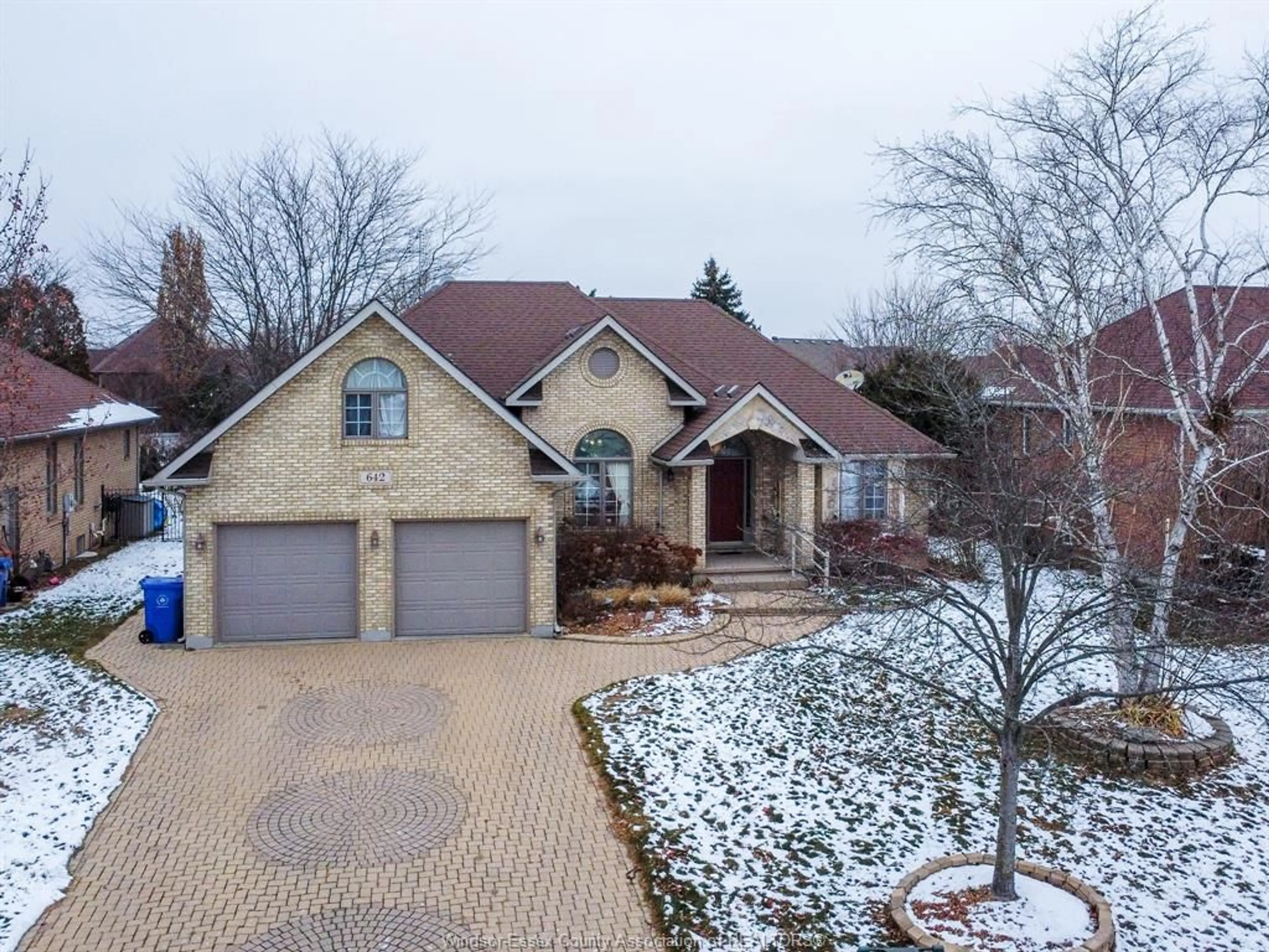 A pic from outside/outdoor area/front of a property/back of a property/a pic from drone, street for 642 LAKE TRAIL Dr, Windsor Ontario N9G 2M3