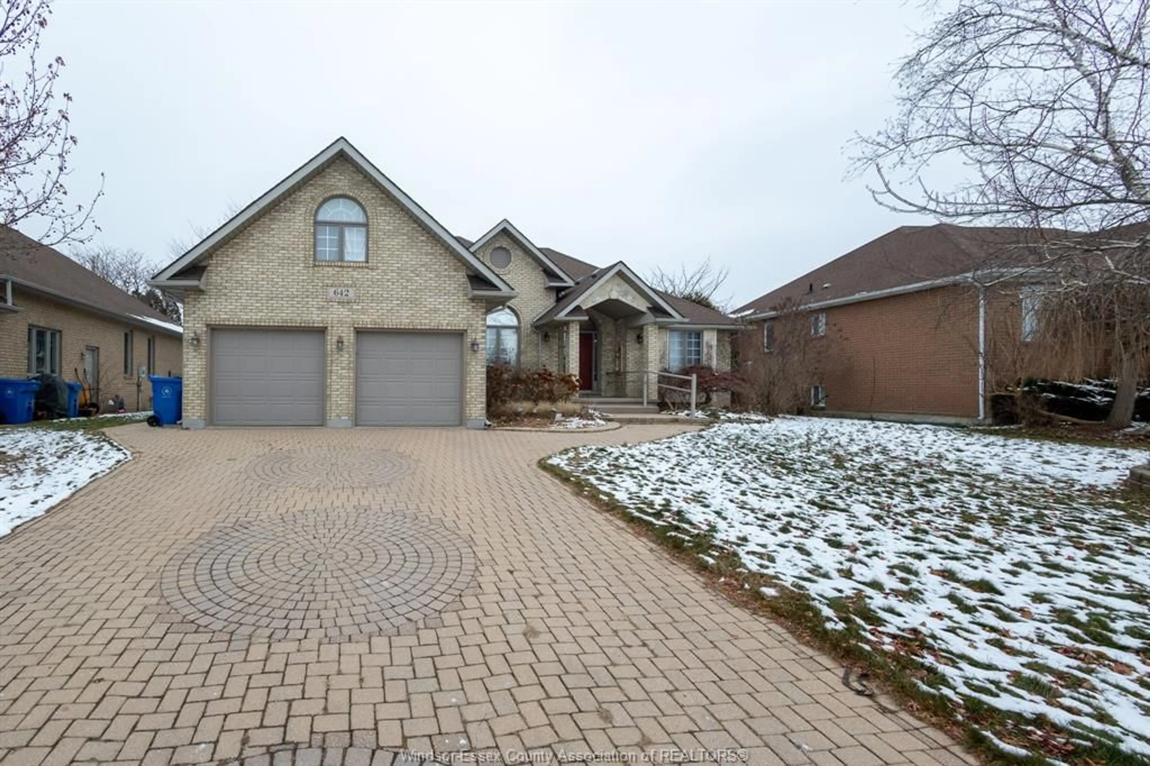 Home with brick exterior material, street for 642 LAKE TRAIL Dr, Windsor Ontario N9G 2M3