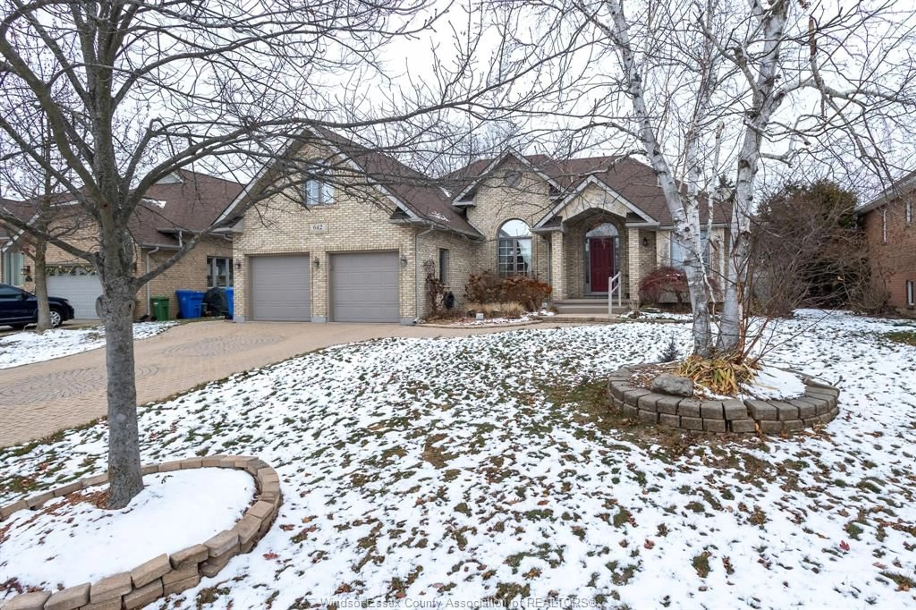 Home with brick exterior material, street for 642 LAKE TRAIL Dr, Windsor Ontario N9G 2M3