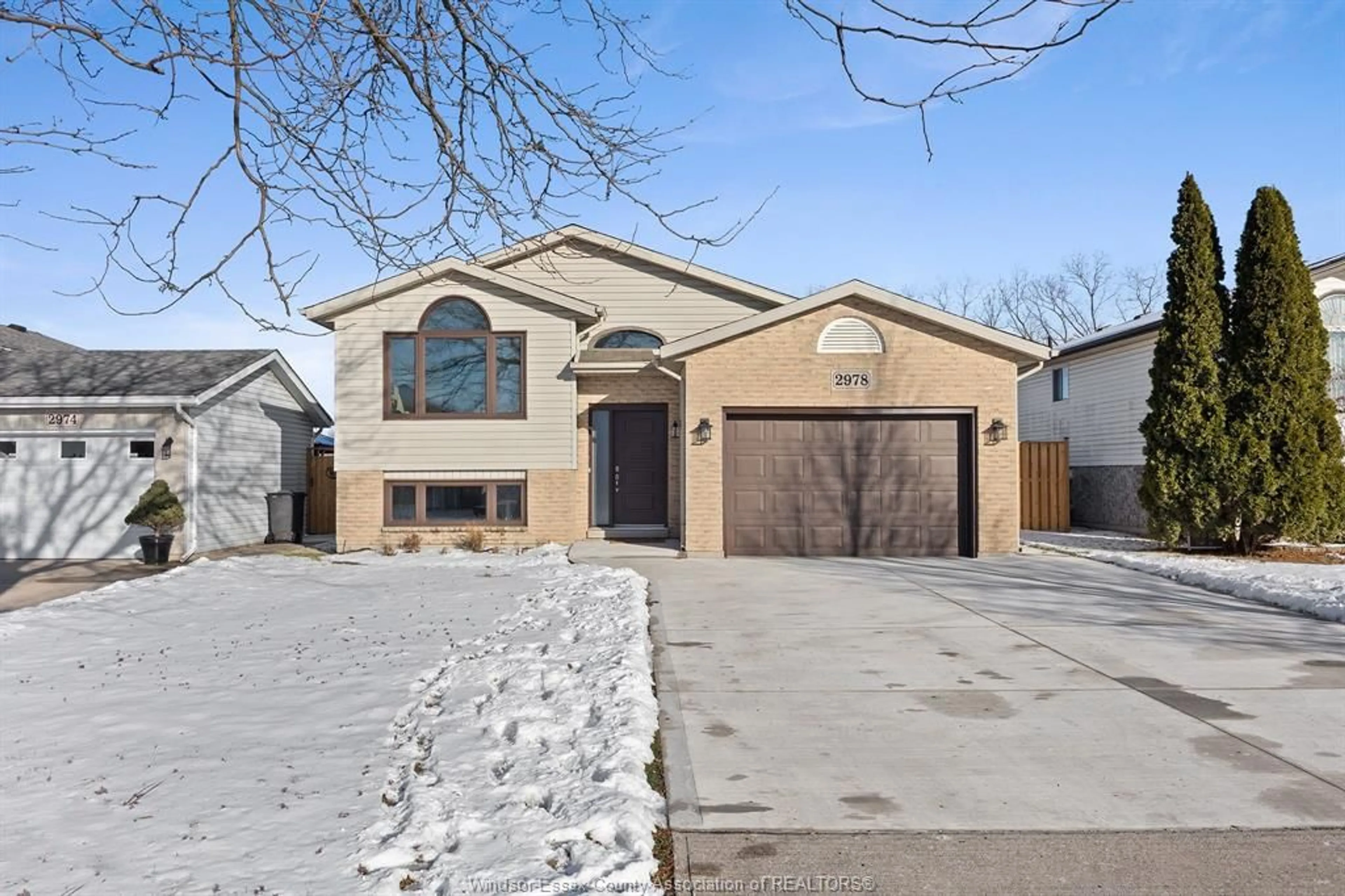 Home with brick exterior material, street for 2978 CONSERVATION Dr, Windsor Ontario N8W 5L5