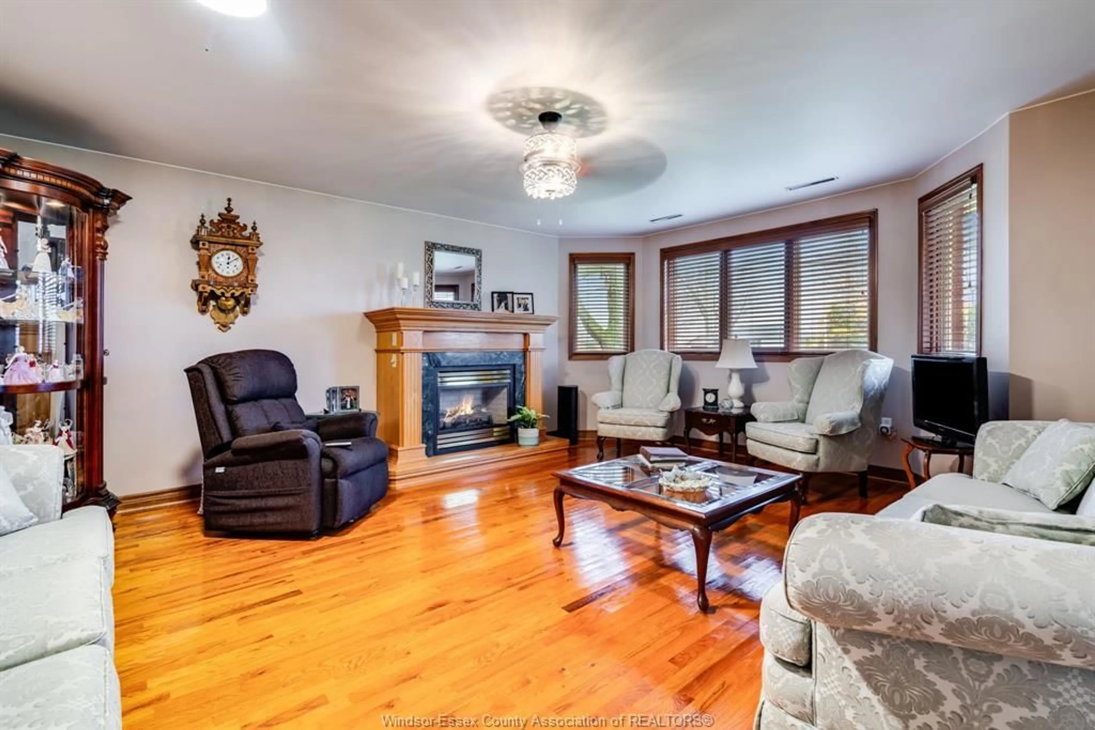 Living room with furniture, wood/laminate floor for 1462 County Rd 22, Lakeshore Ontario N8L 0H9