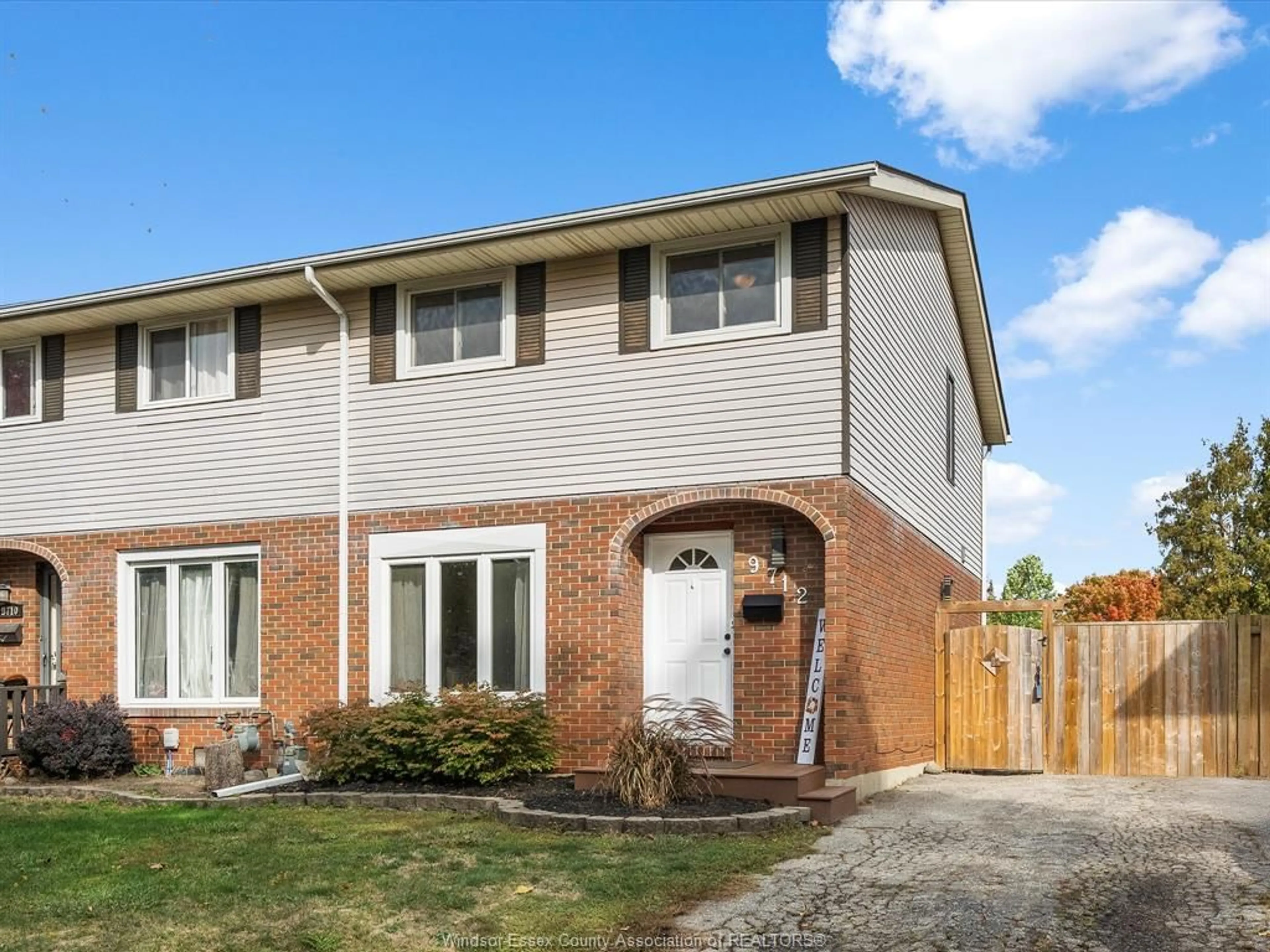 Home with brick exterior material, street for 9712 LYNNGROVE Cres, Windsor Ontario N8R 1B7