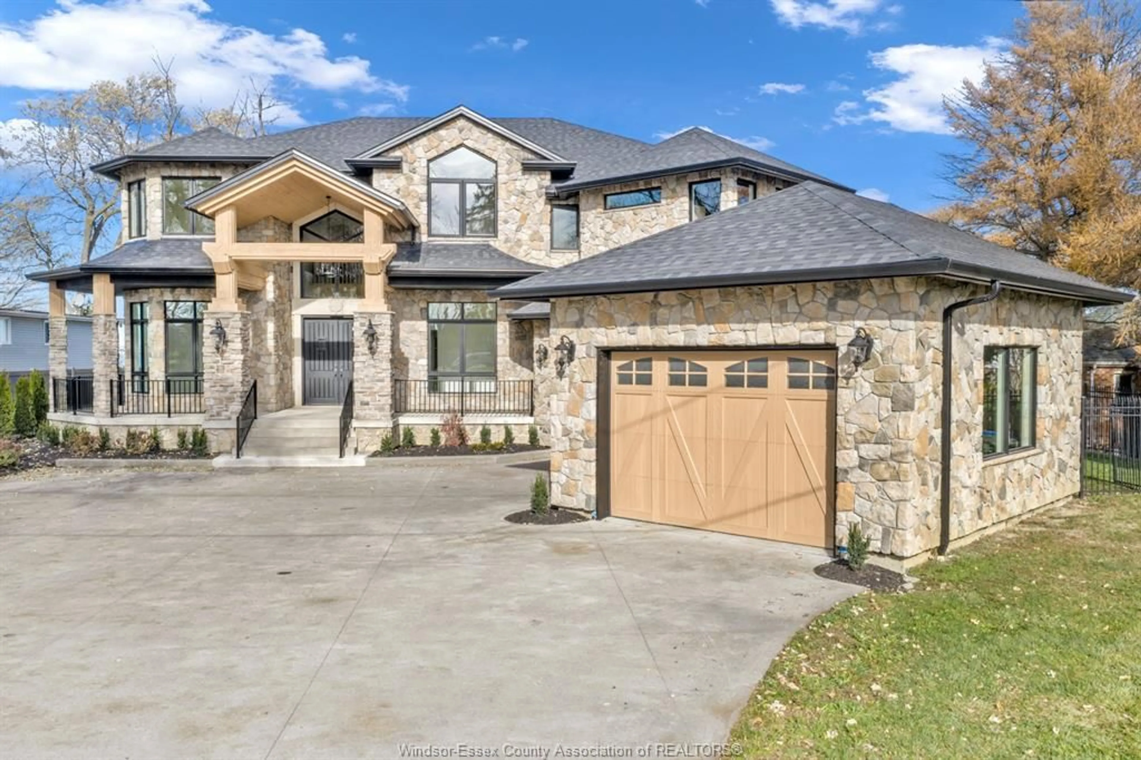 Home with brick exterior material, street for 720 OLD TECUMSEH Rd, Lakeshore Ontario N0R 1A0