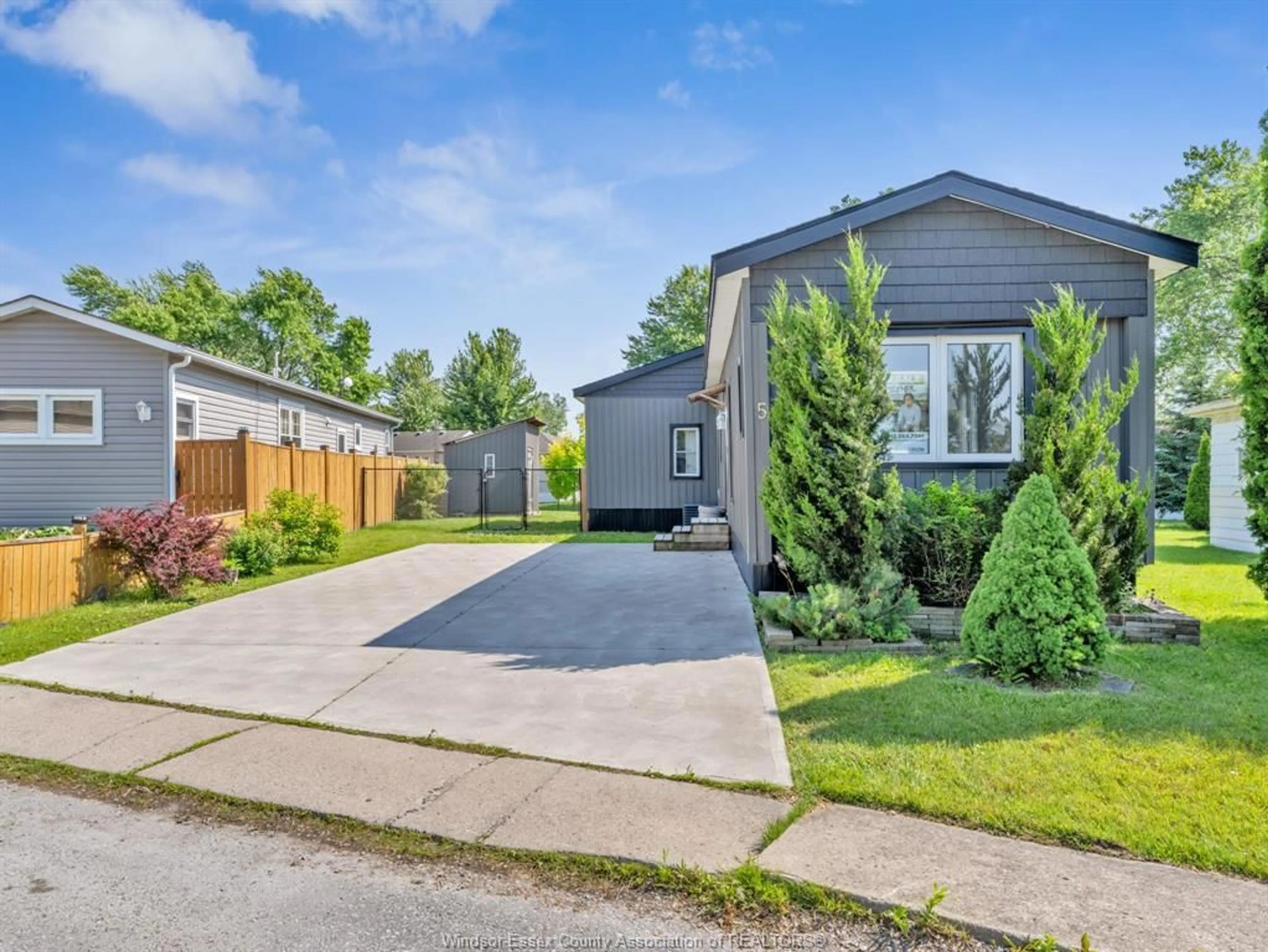 Home with vinyl exterior material, street for 5 MAPLE Dr, McGregor Ontario N0R 1J0